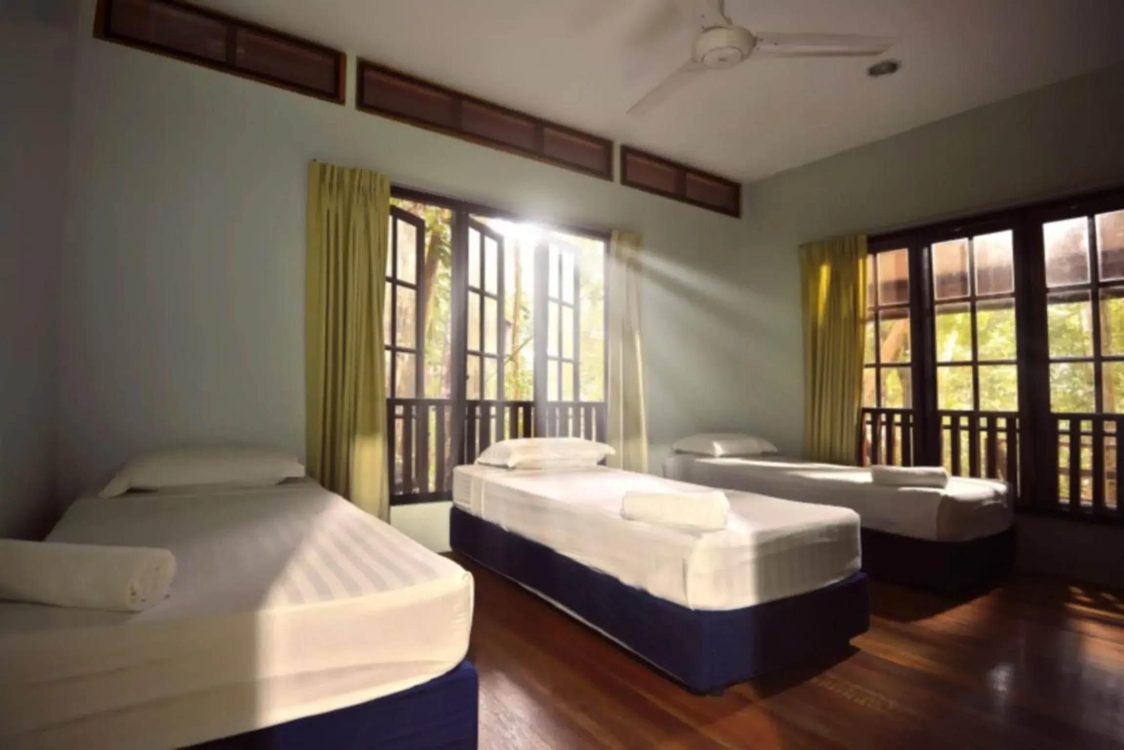 Bed in Permai Rainforest Resort