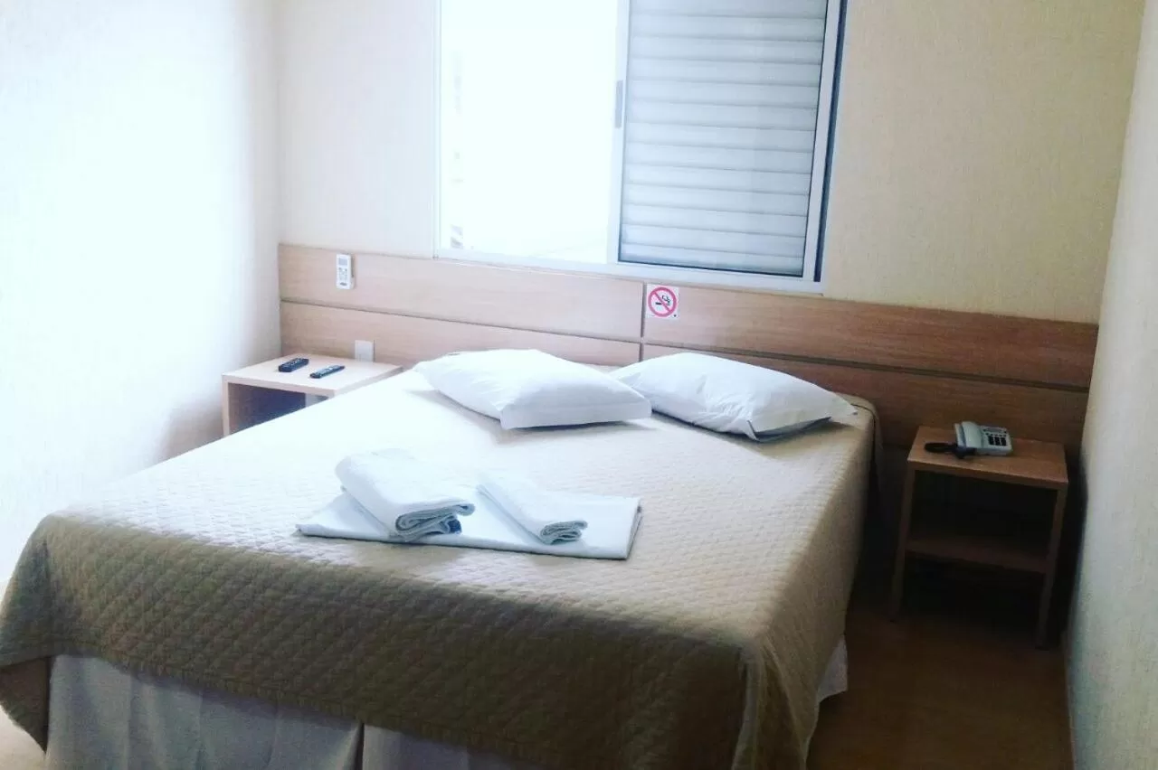 Bed in Onix Inn Hotel