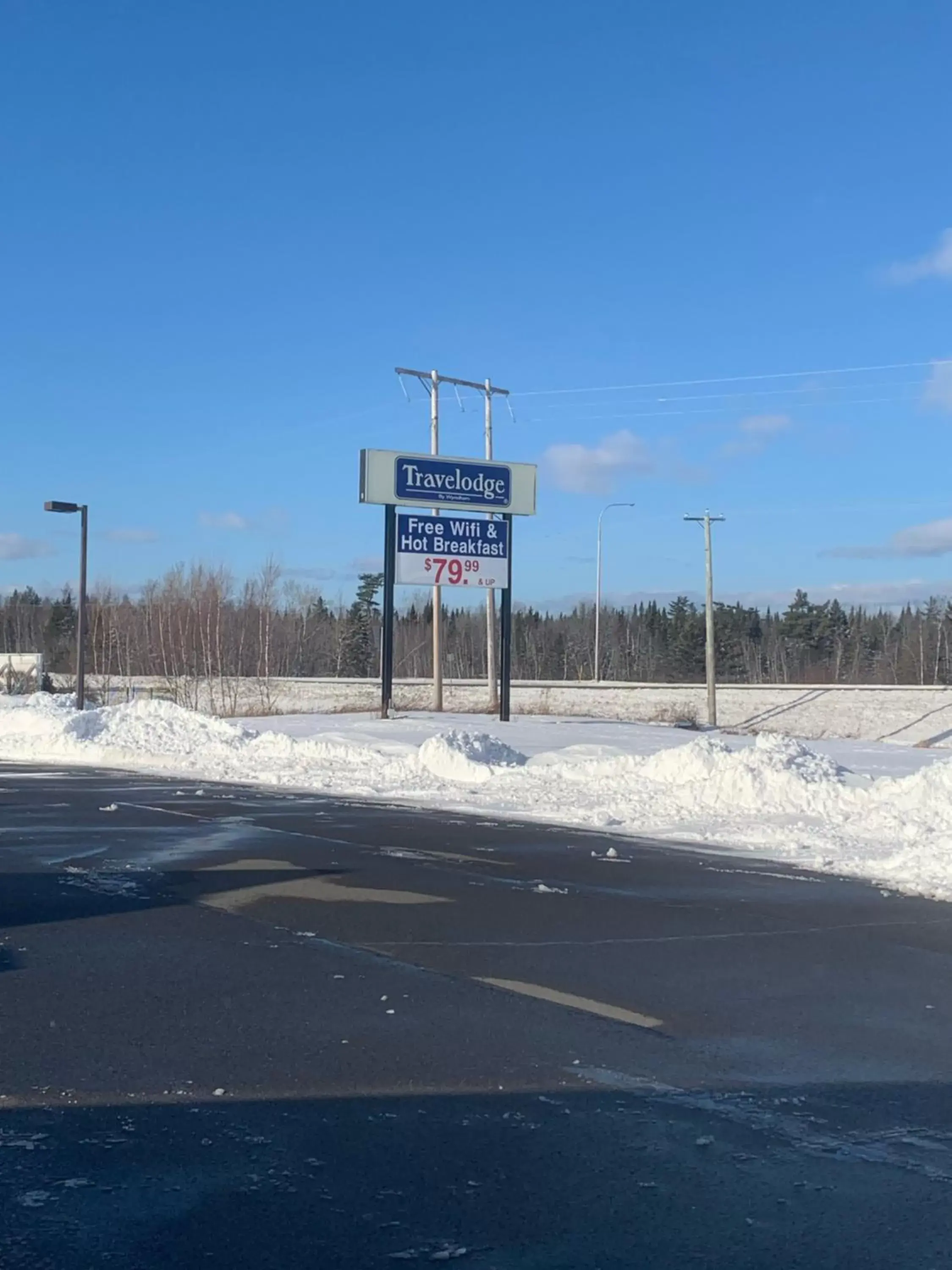 Property logo or sign in Travelodge by Wyndham Fredericton