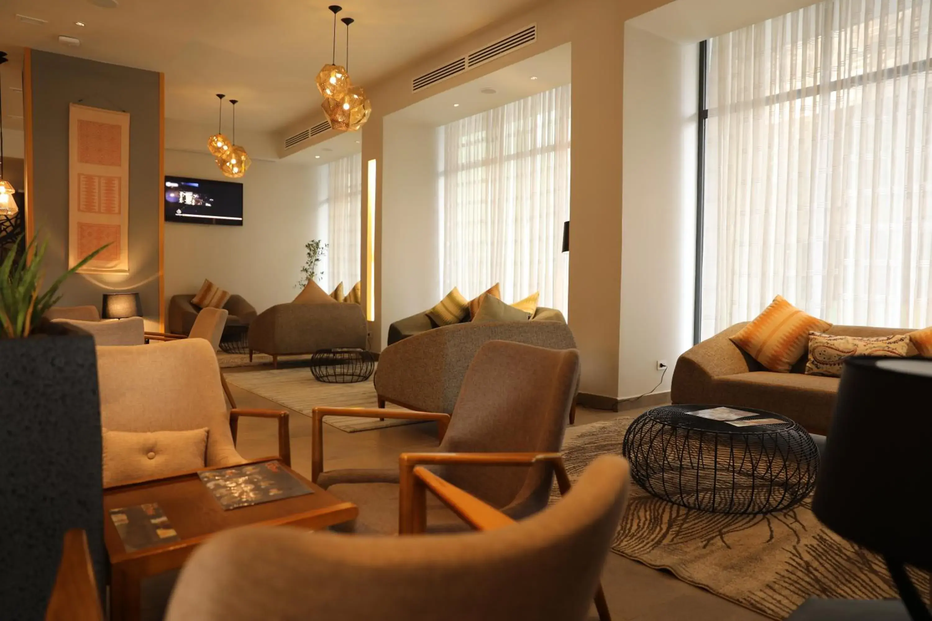 Lounge or bar, Seating Area in Mado Hotel