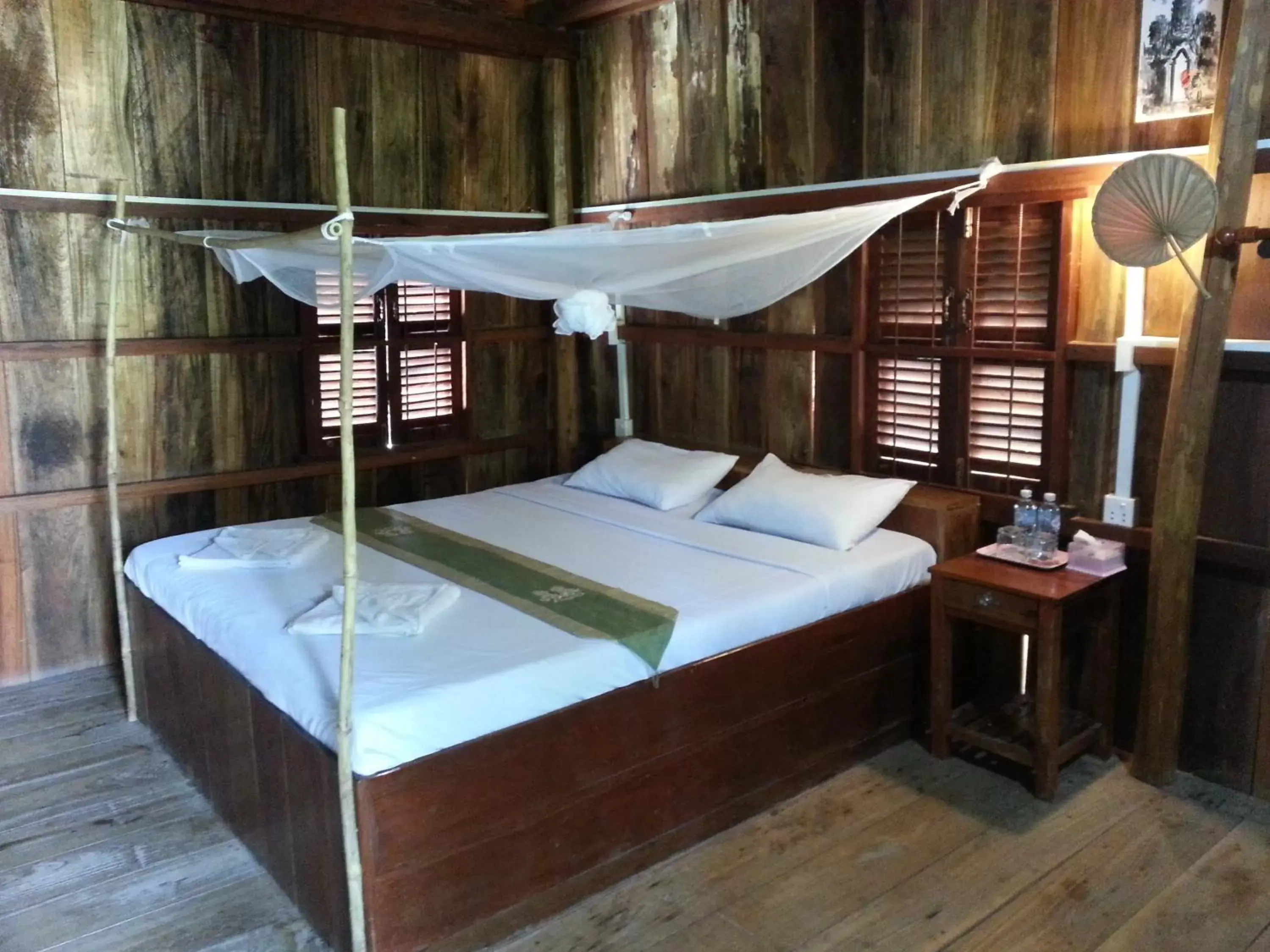 Bed in Bird of Paradise Bungalows