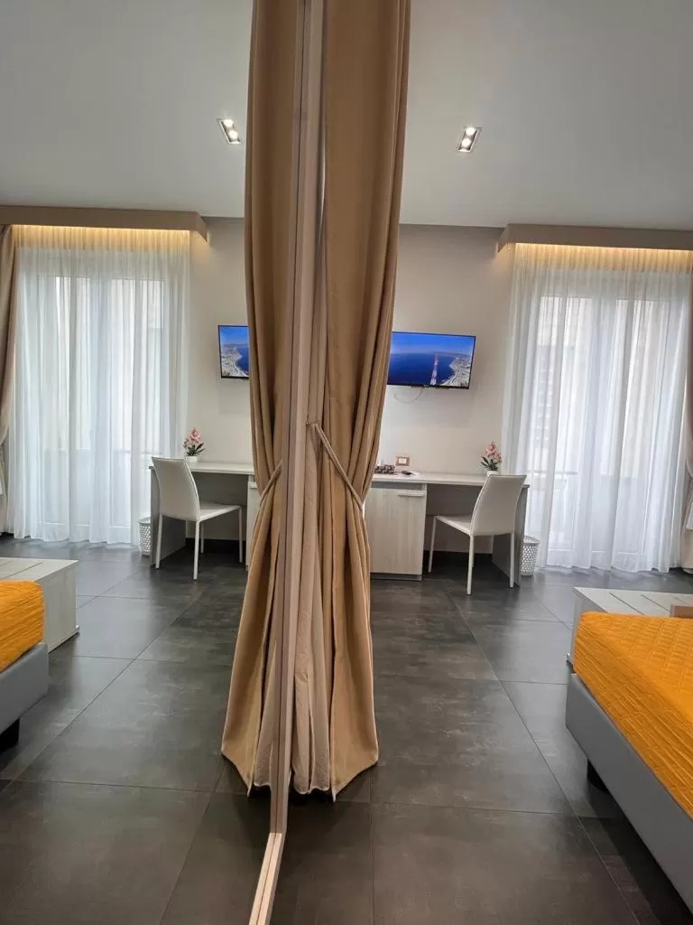 Bed, TV/Entertainment Center in B&B Margherita