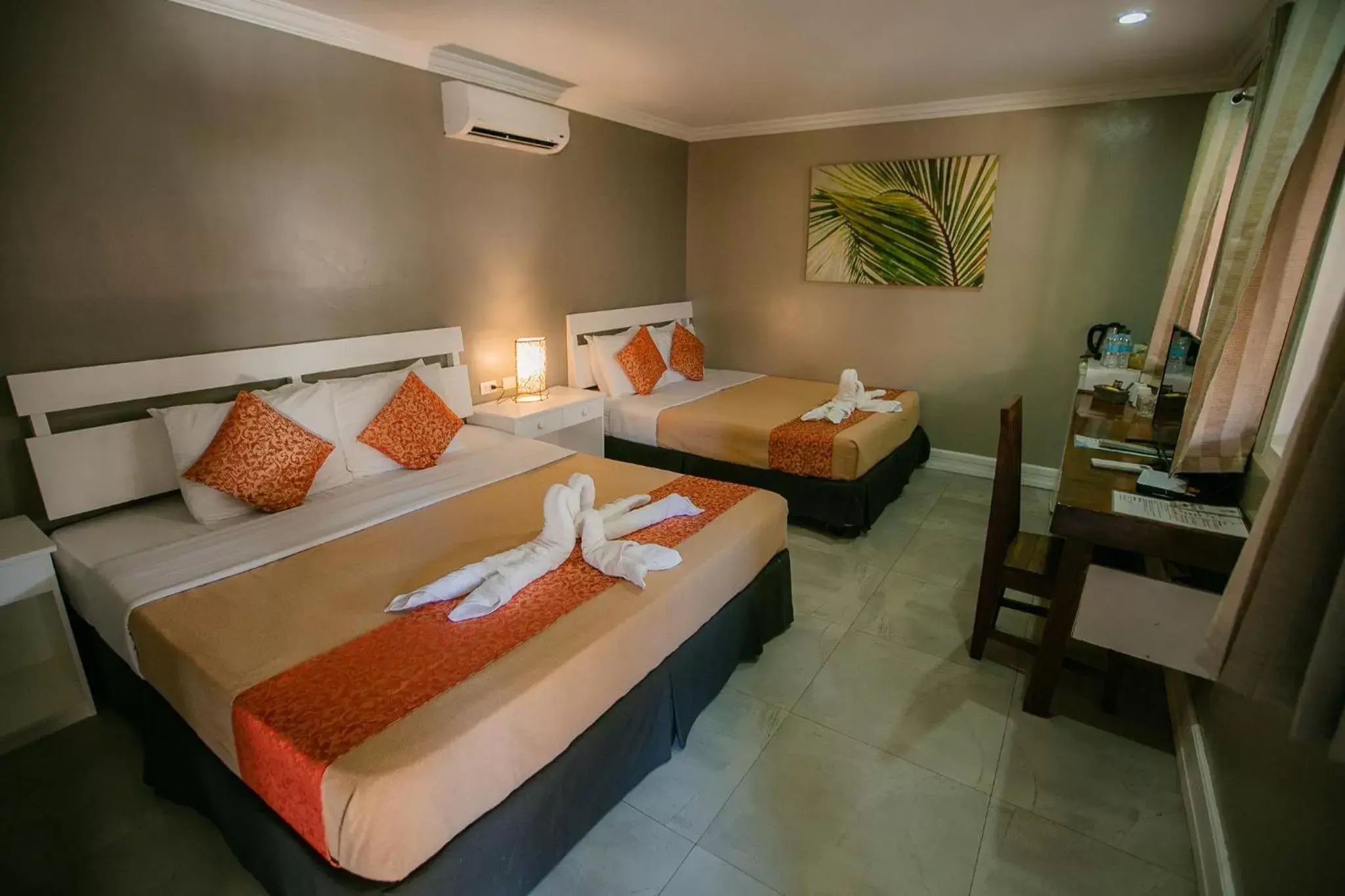 Bed in Kav's Beach Resort