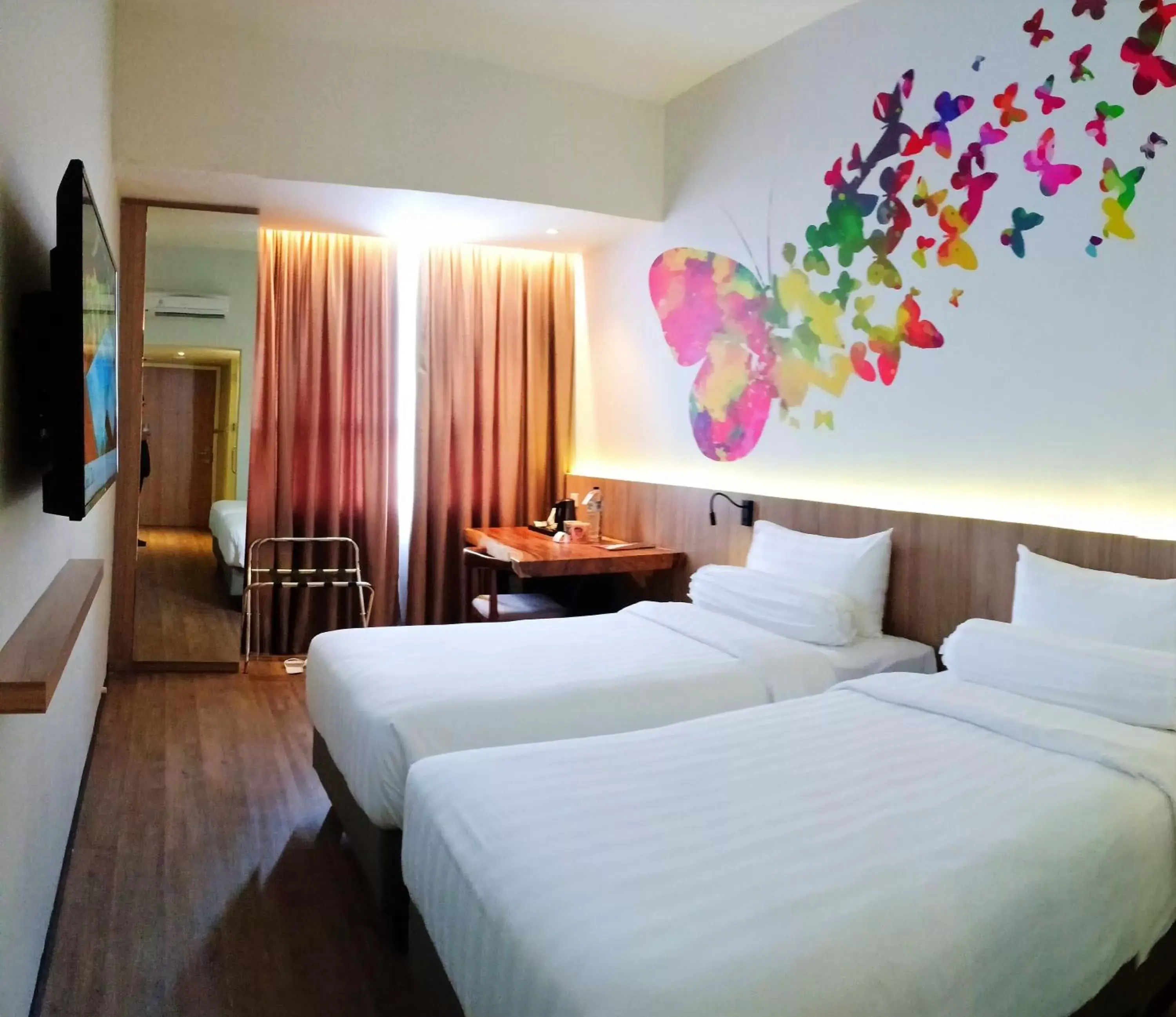 Bed in The Zuri Hotel Palembang