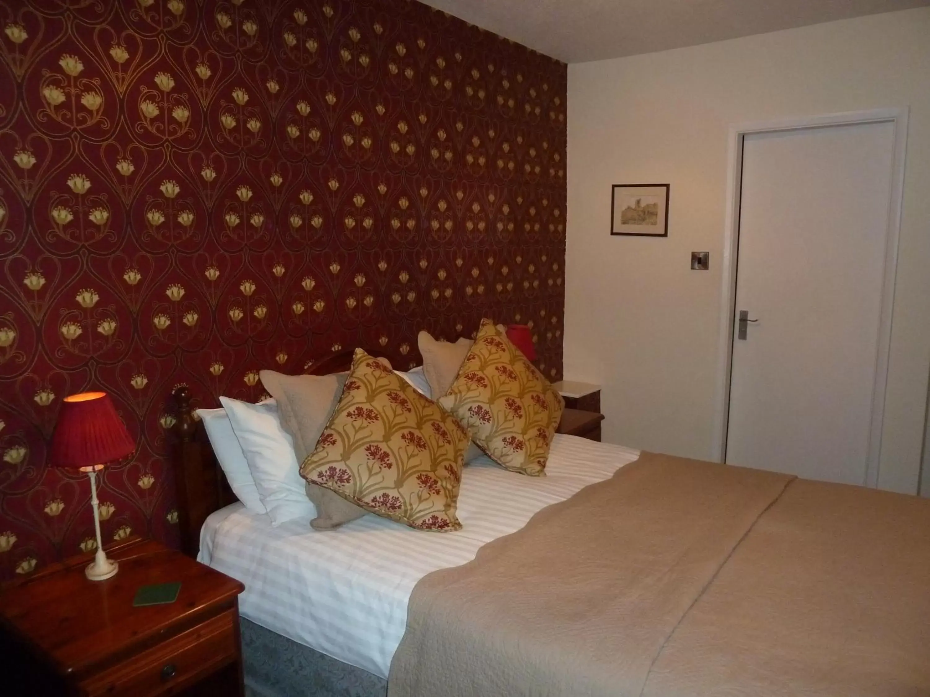 Decorative detail, Bed in Blacksmiths Arms Inn