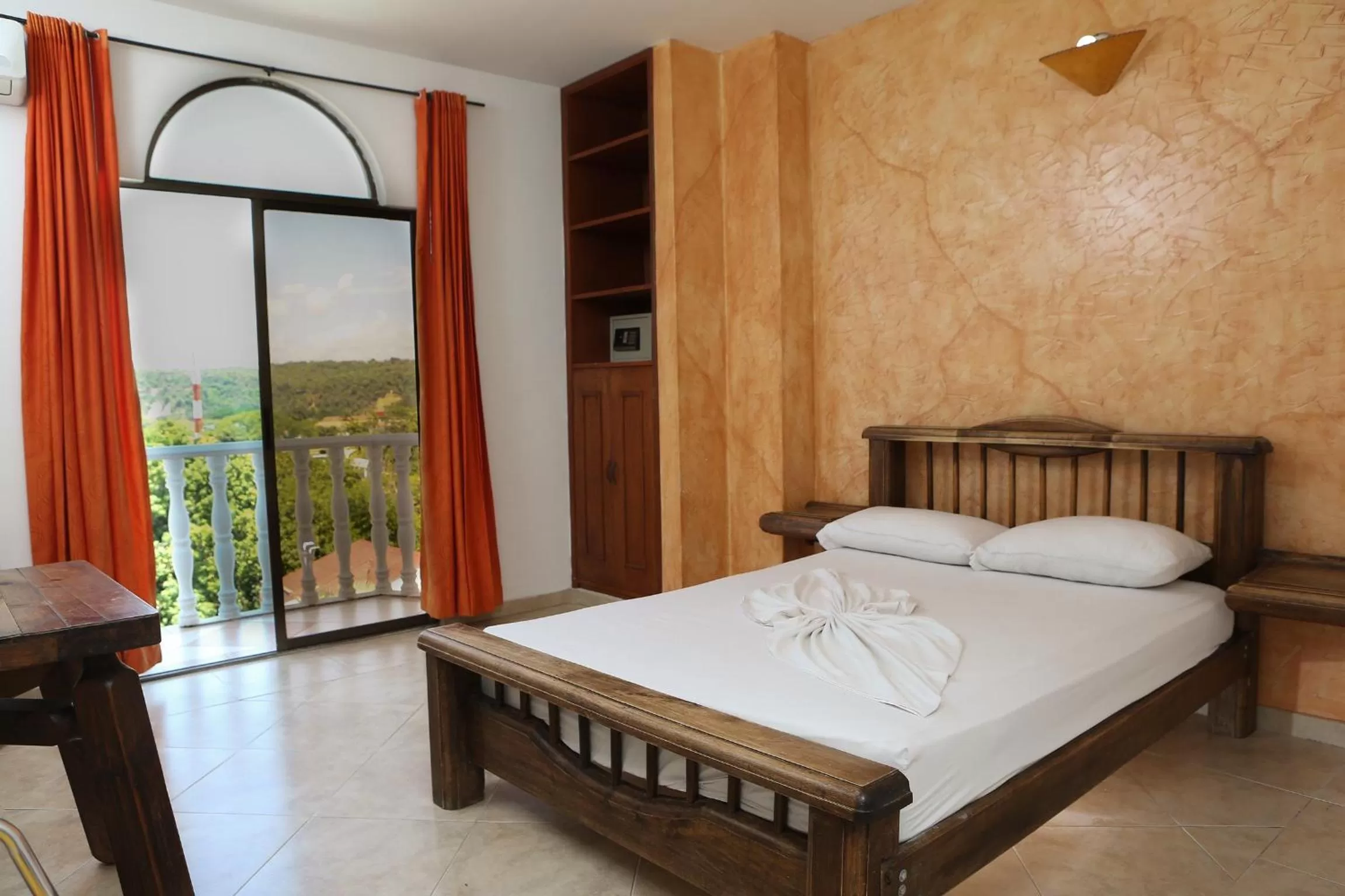 Bed in Hotel Anamichu Suites