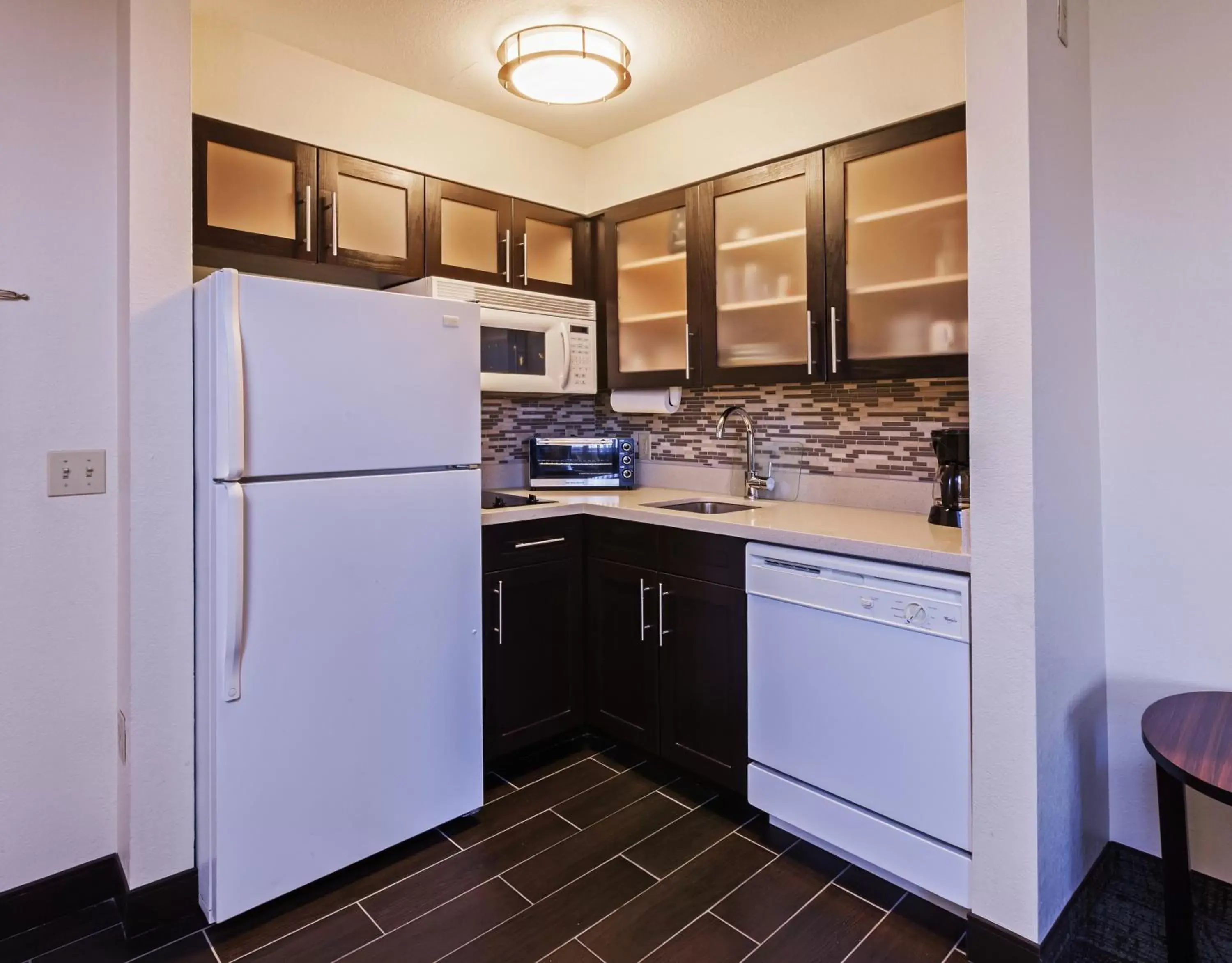 Kitchen or kitchenette, Kitchen/Kitchenette in Staybridge Suites Tulsa-Woodland Hills, an IHG Hotel