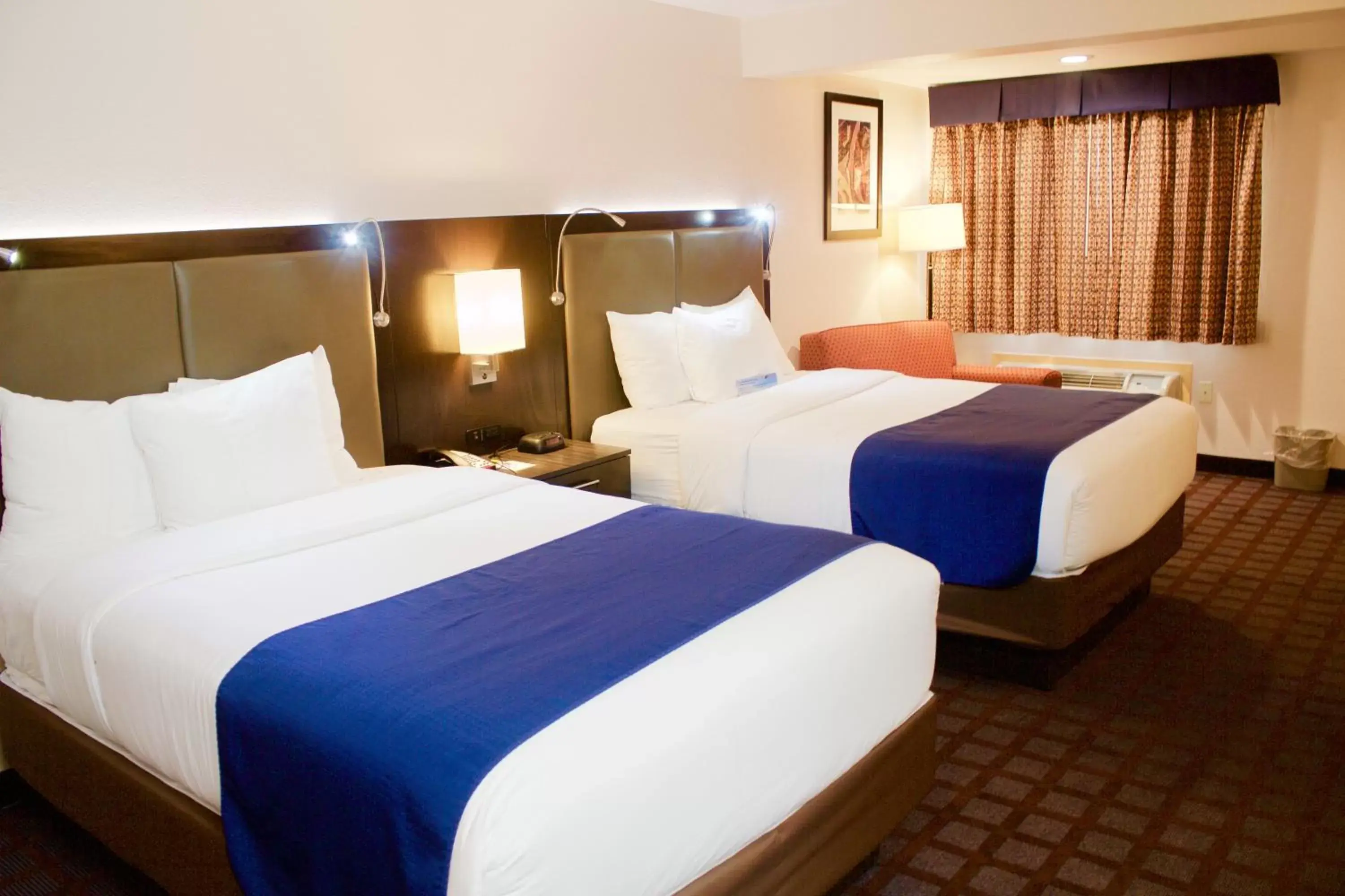 Photo of the whole room, Bed in Days Inn by Wyndham Woodbury Long Island