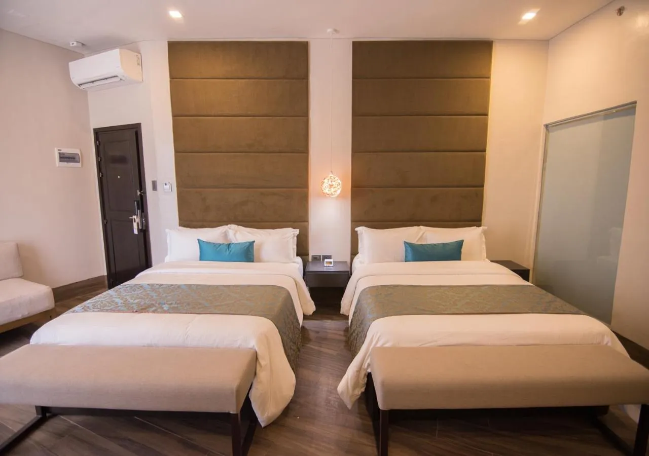 Bed in Goldberry Lite Hotel