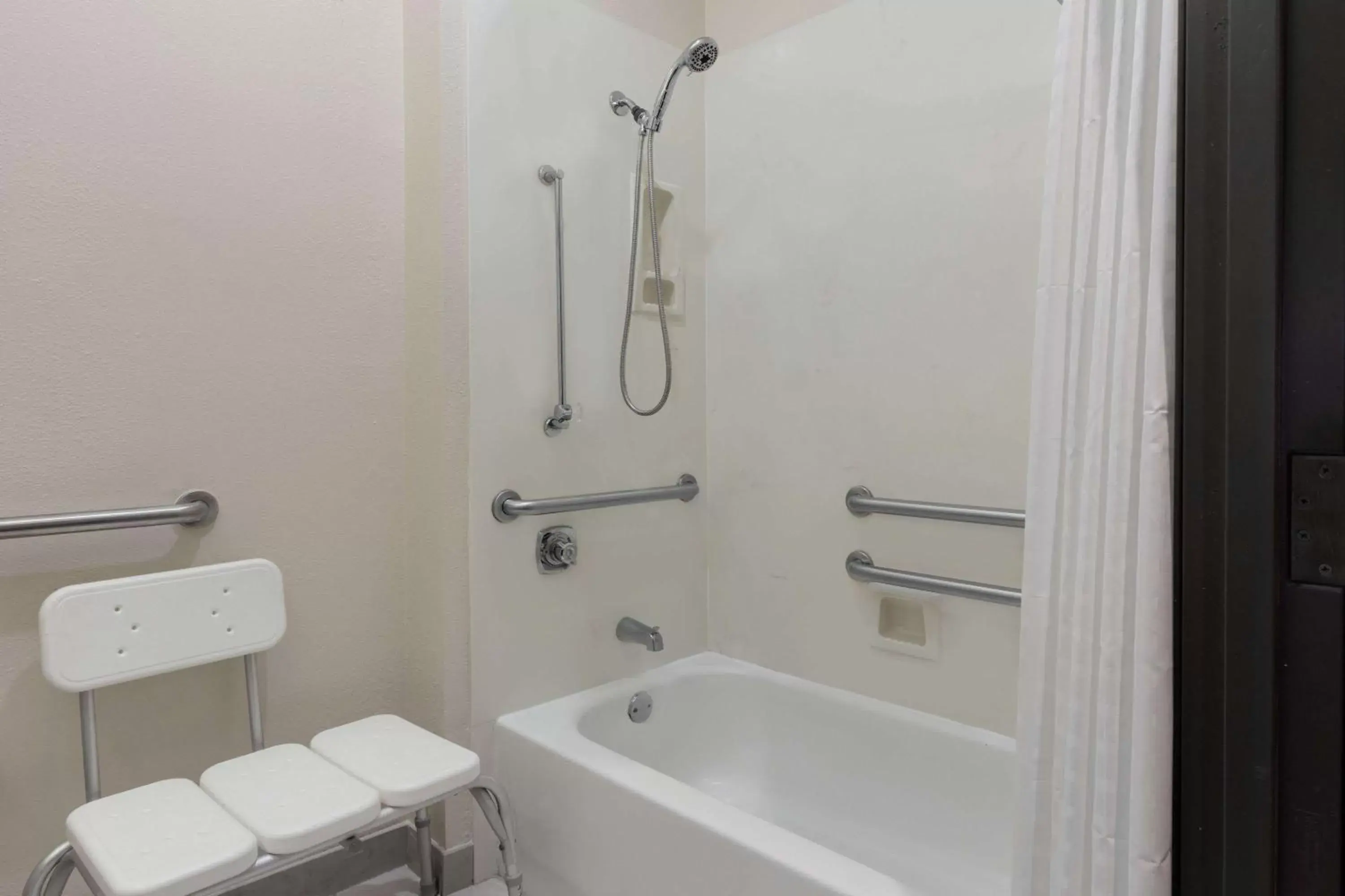 Bathroom in Days Inn & Suites by Wyndham Sulphur Springs