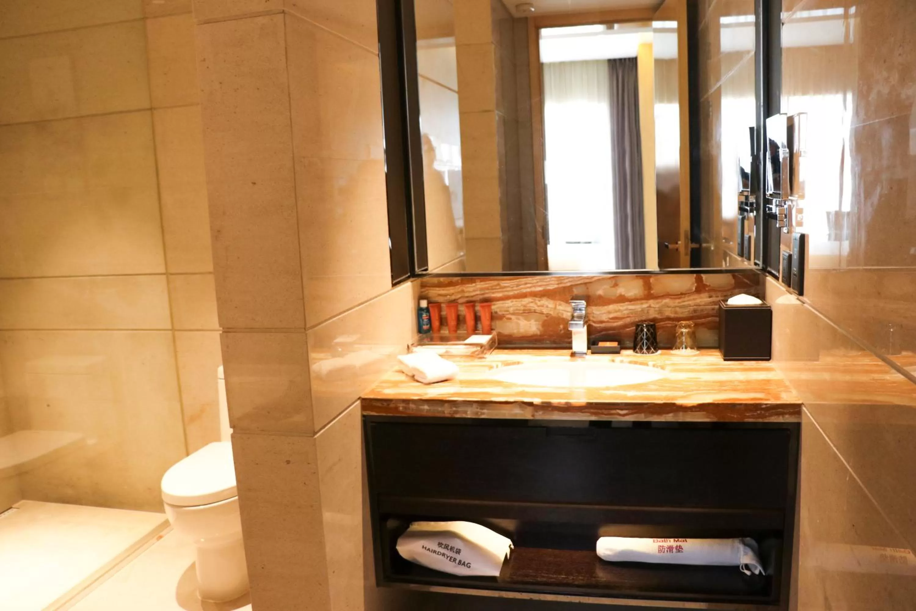 Toilet in Crowne Plaza Beijing Lido by IHG