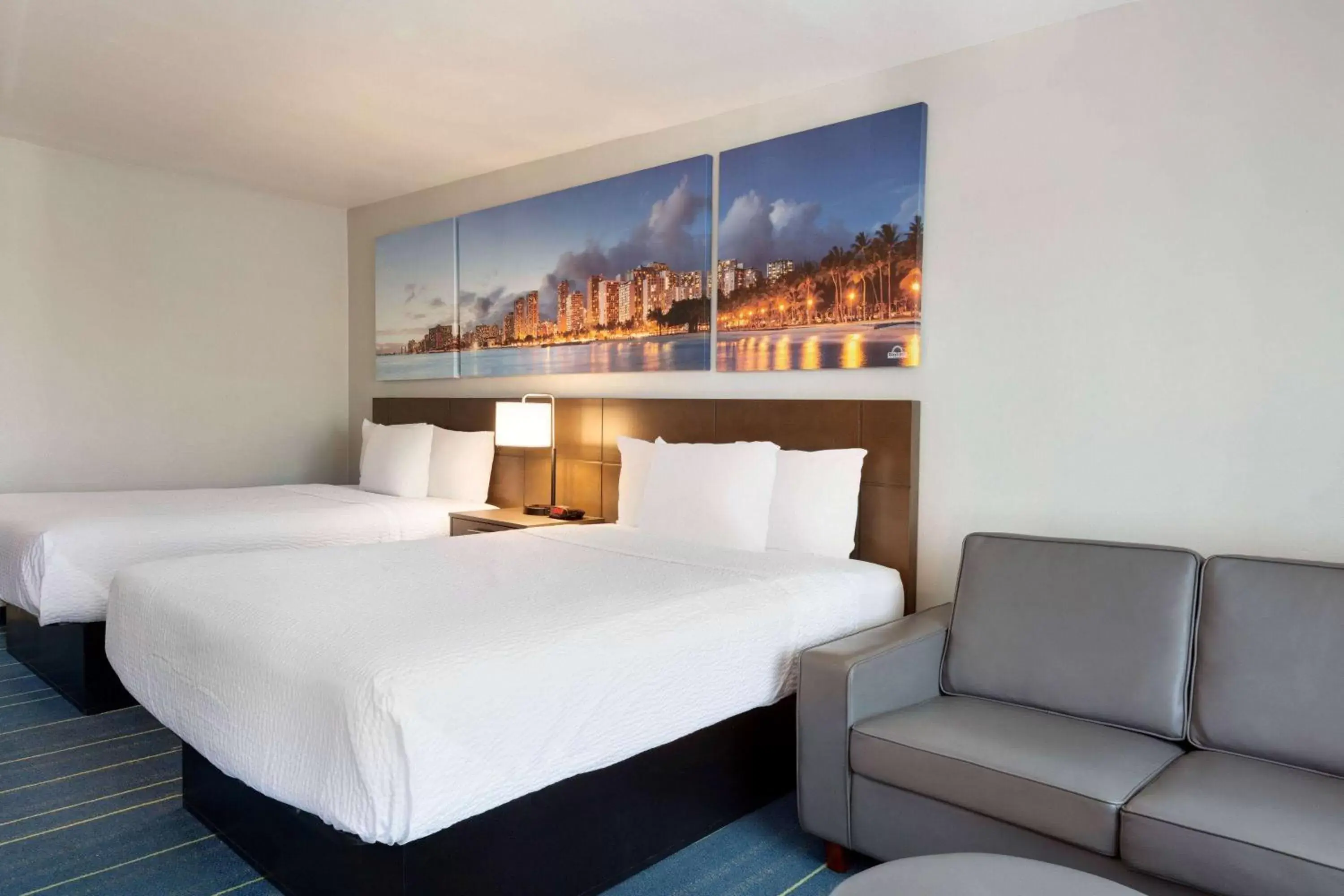Photo of the whole room, Bed in Days Inn & Suites by Wyndham Anaheim At Disneyland Park Photo of the whole room, Bed in Days Inn & Suites by Wyndham Anaheim At Disneyland Park