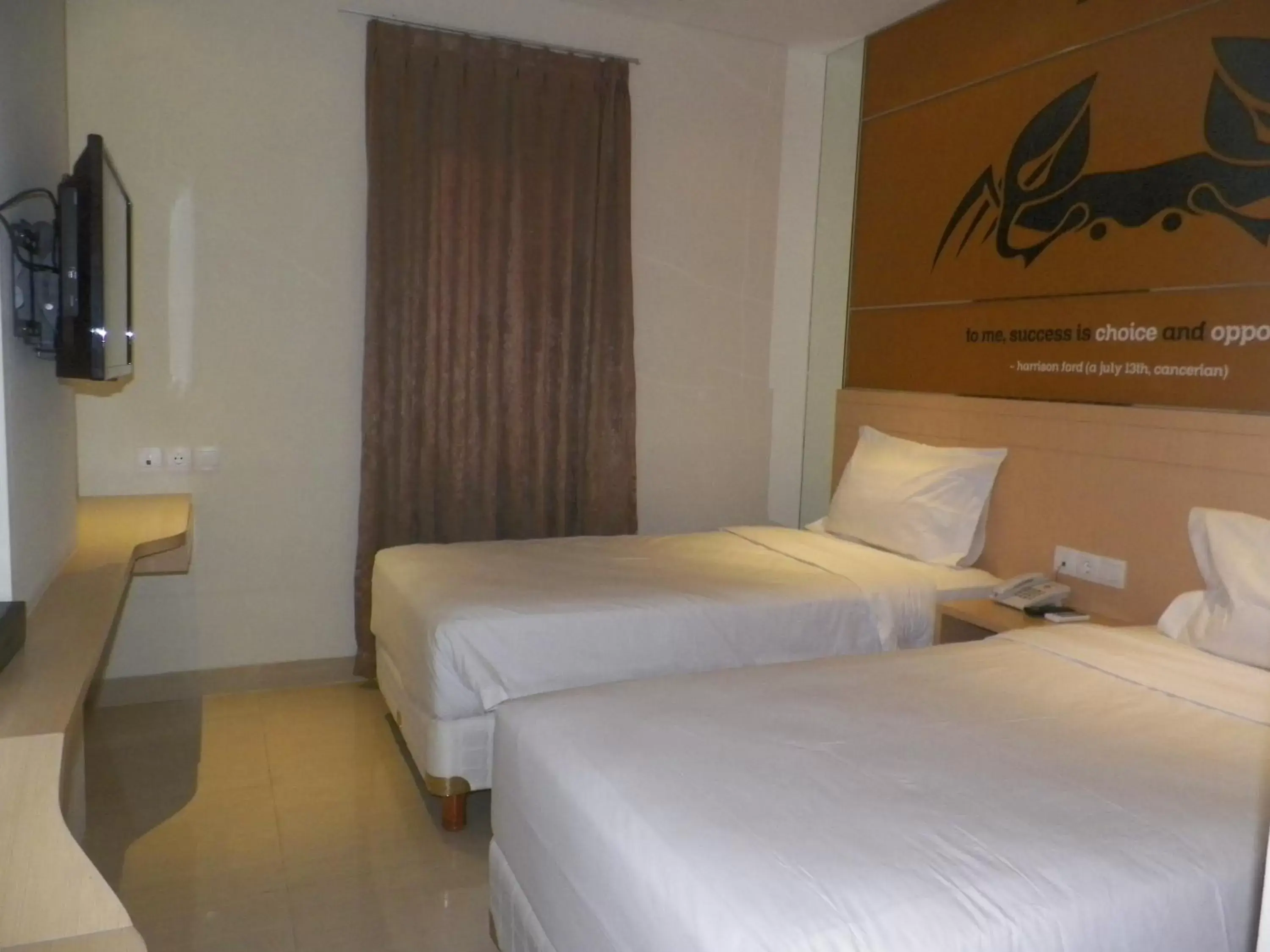 Bed in Zodiak Asia Afrika by KAGUM Hotels