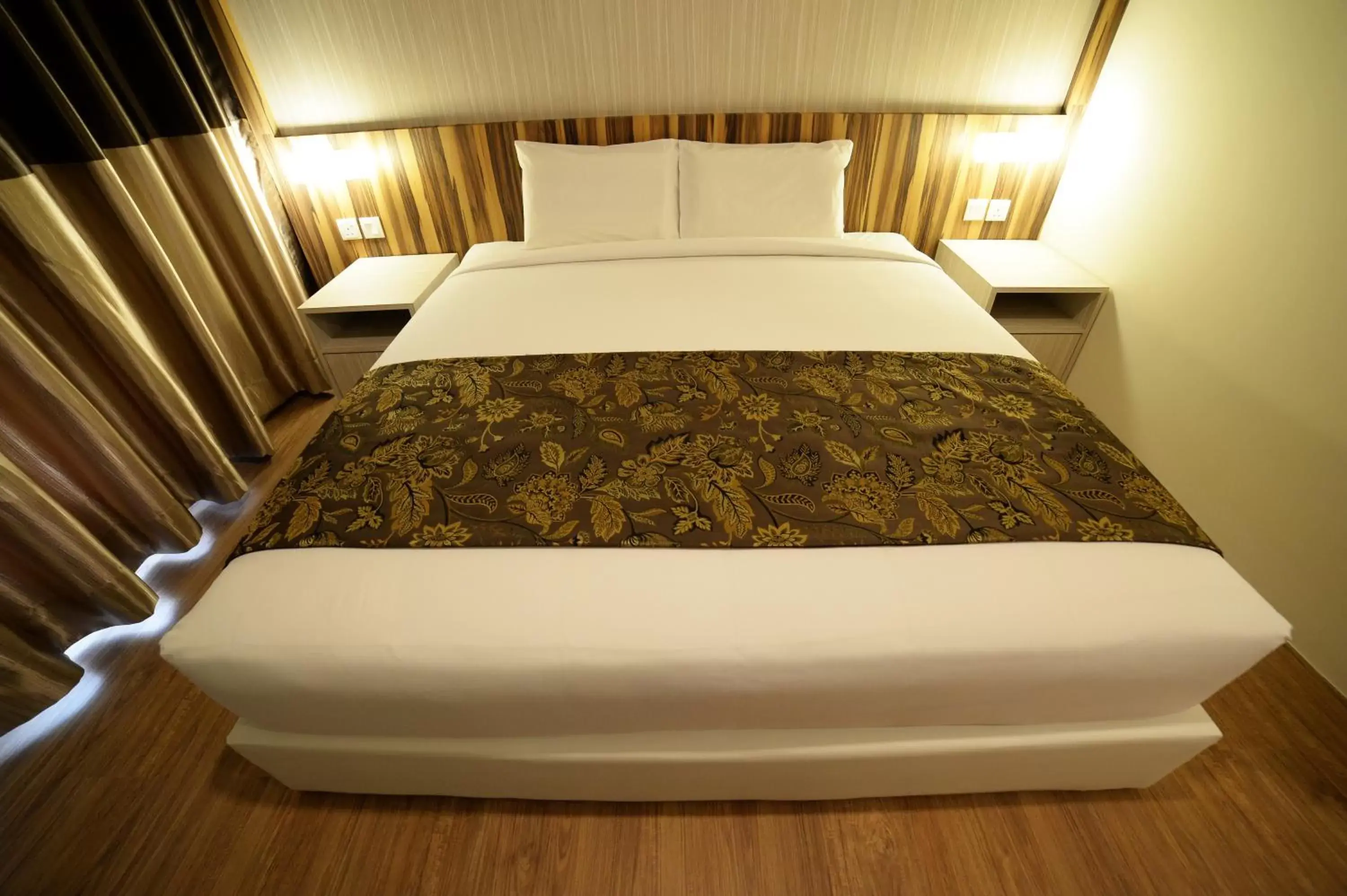 Bed in Rimba Hotel