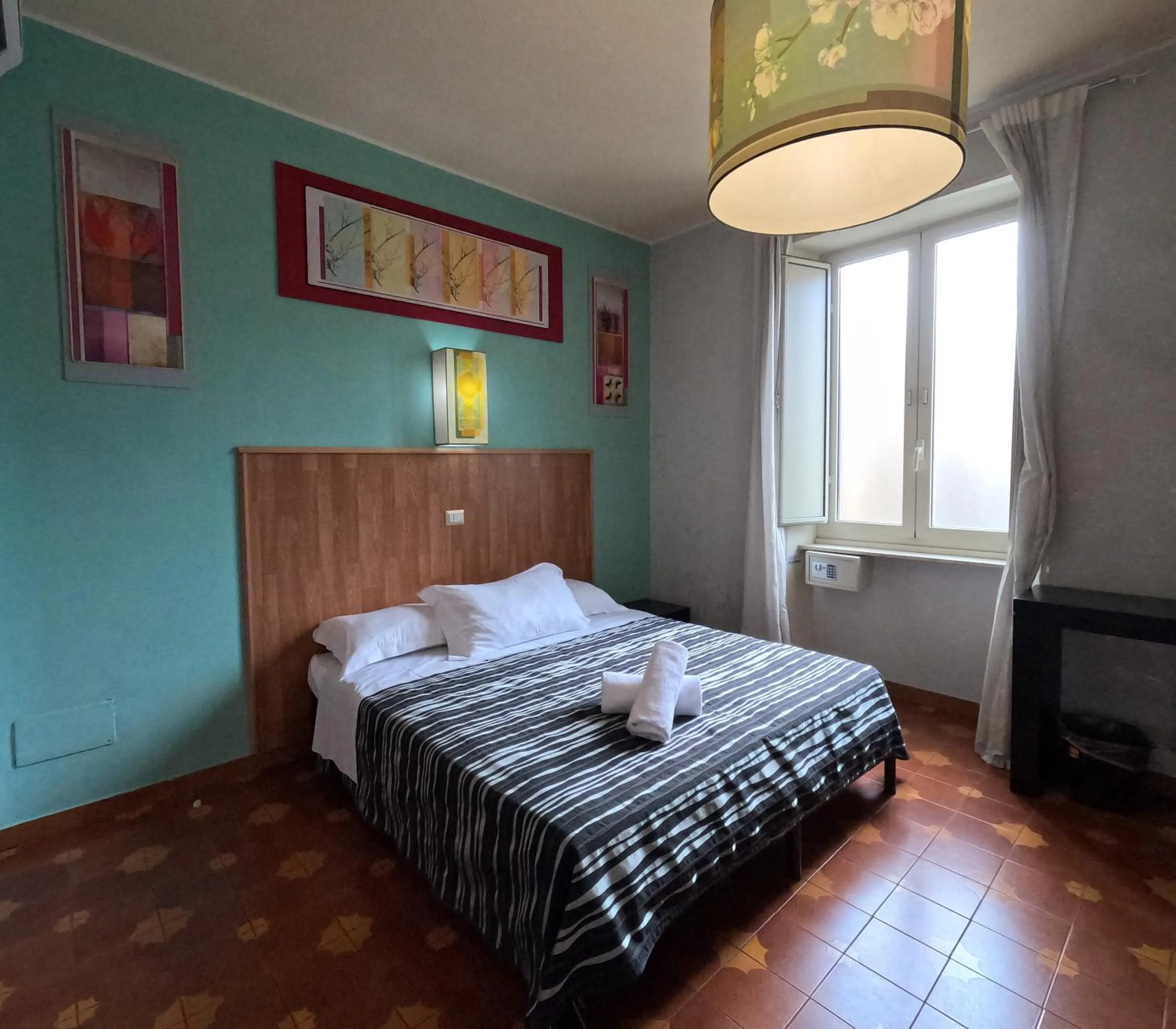 Bed in Roma Room Hotel