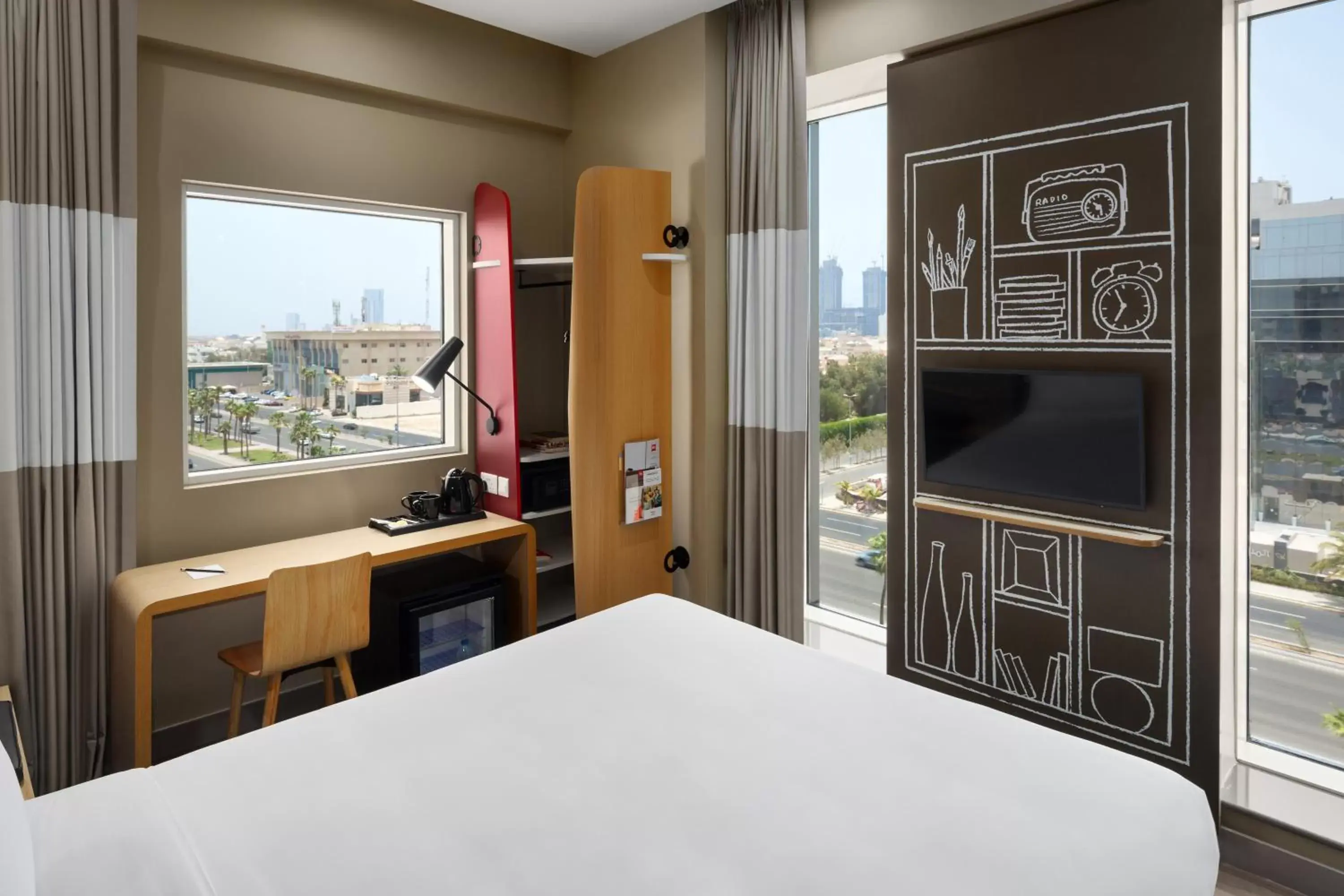 Photo of the whole room, TV/Entertainment Center in Ibis Jeddah Malik Road