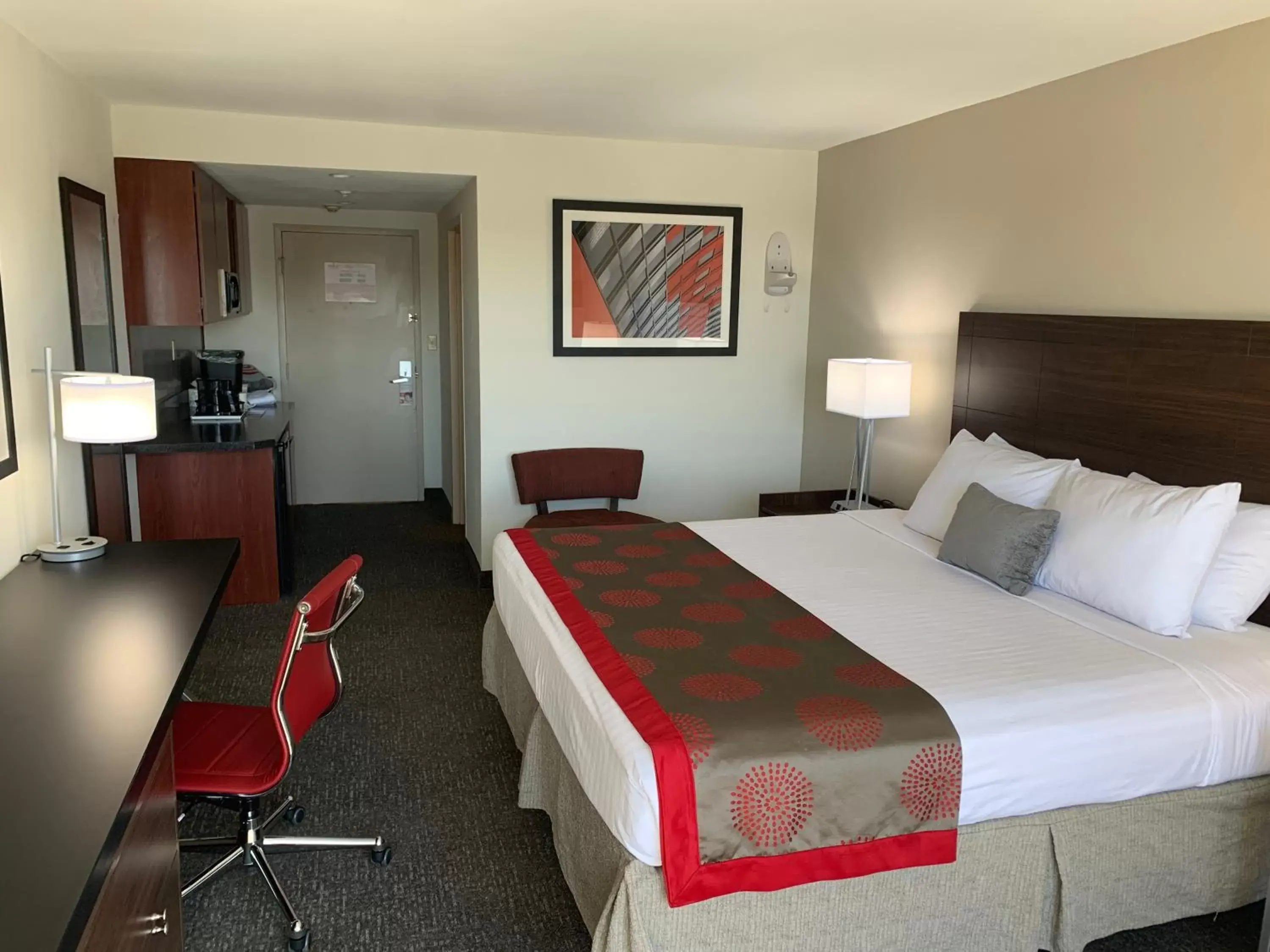 Photo of the whole room, Bed in Ramada by Wyndham Sarasota Waterfront