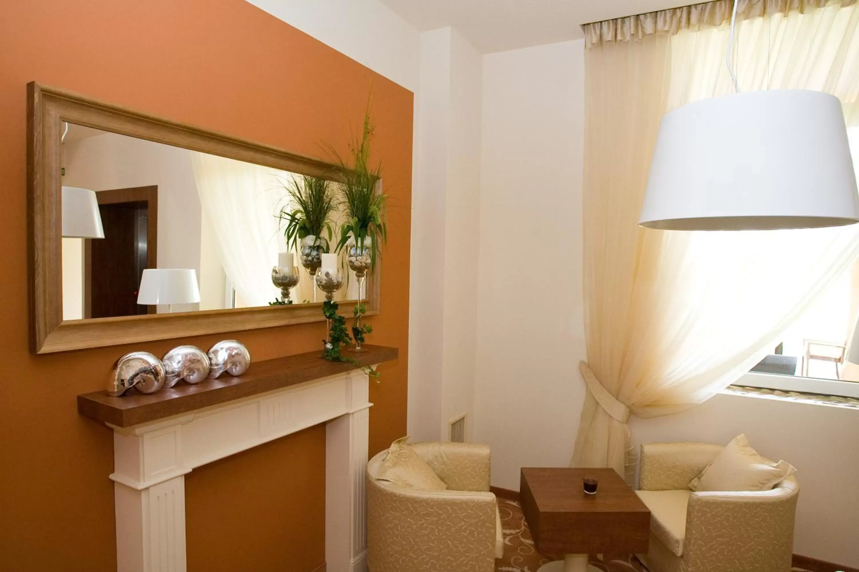 Seating area, Bathroom in Ambient Hotel