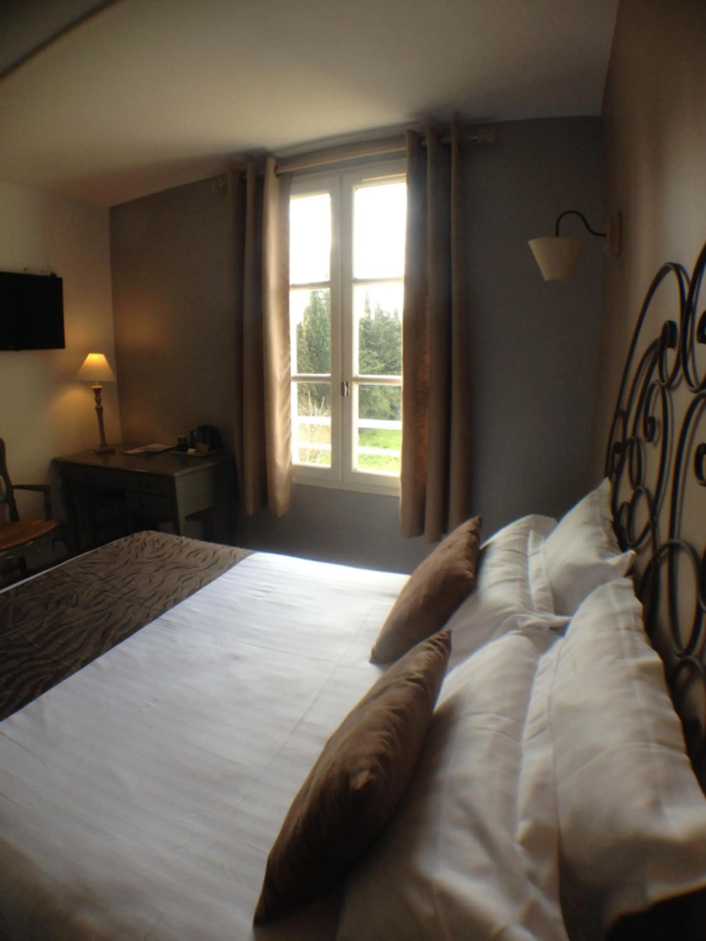 Photo of the whole room, Bed in Logis Hotel la Ferme