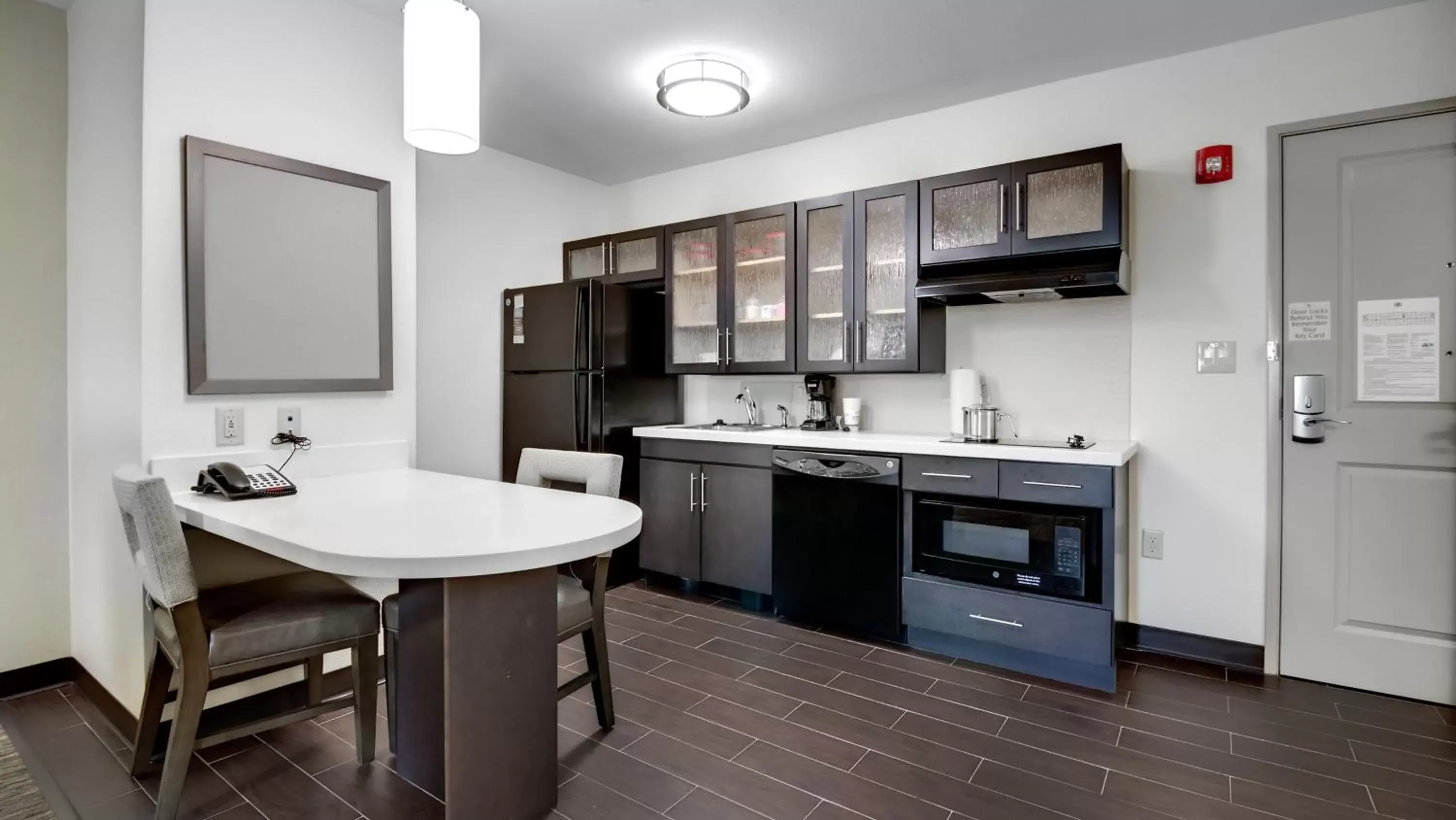 Photo of the whole room, Kitchen/Kitchenette in Candlewood Suites Waco, an IHG Hotel