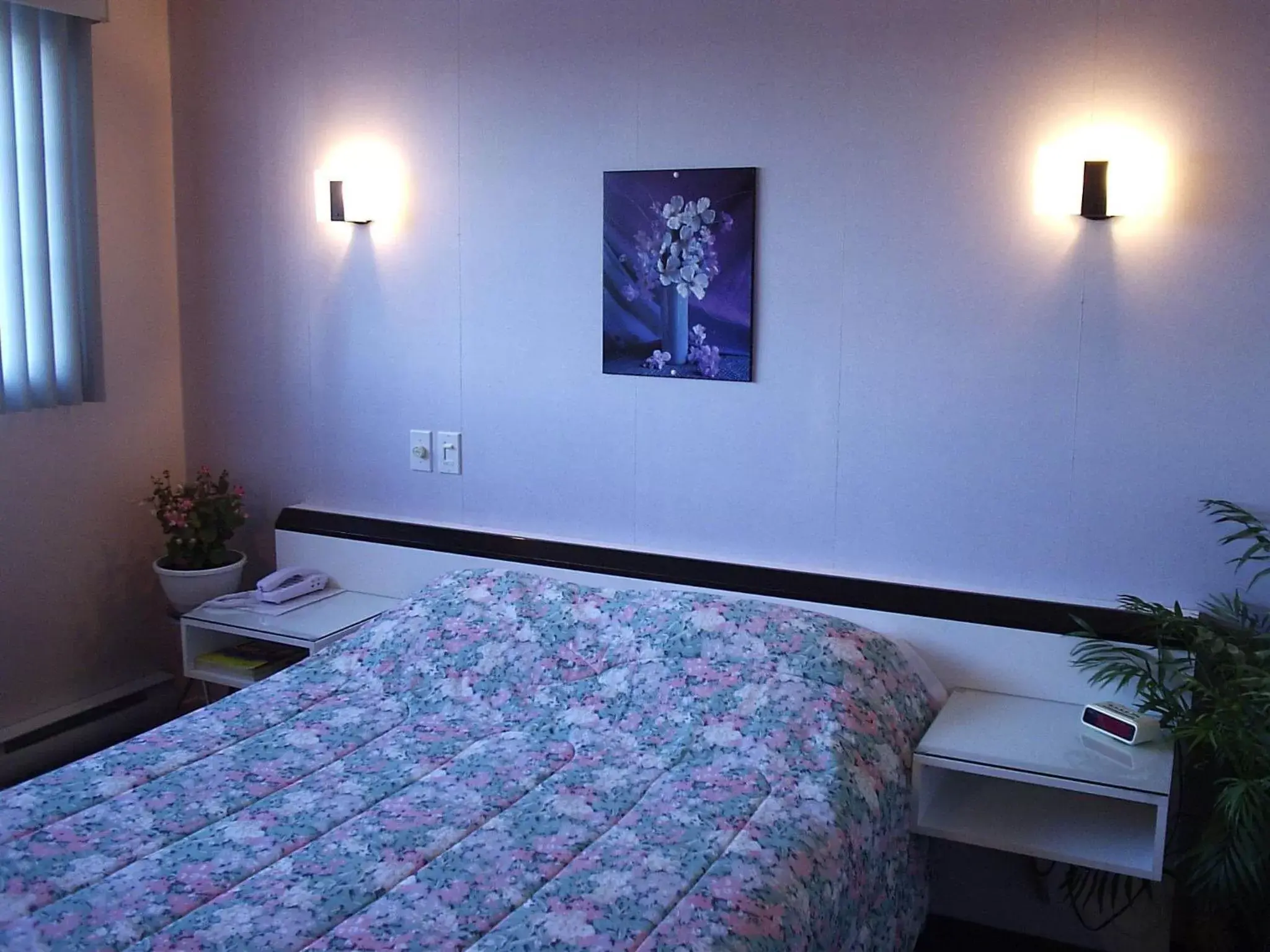 Bed in Motel Normandie