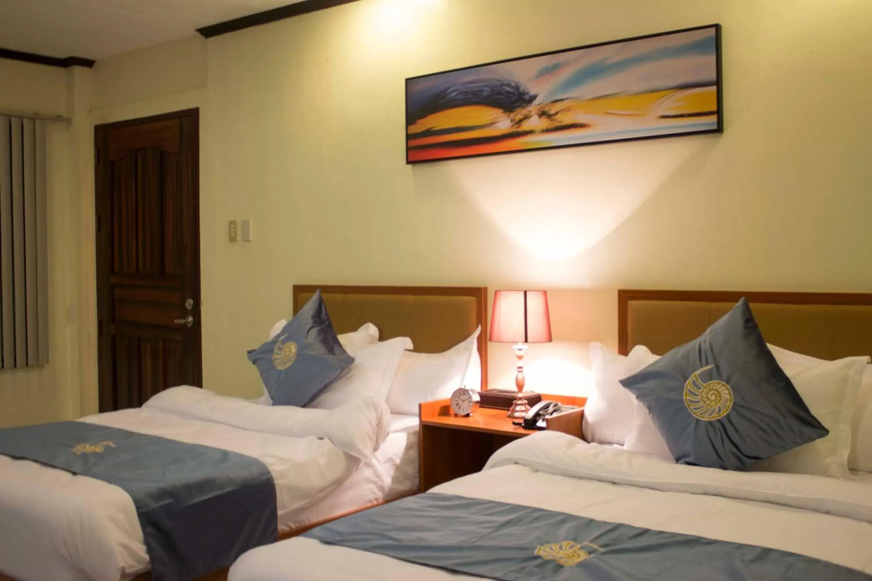 Photo of the whole room, Bed in Costa Palawan Resort