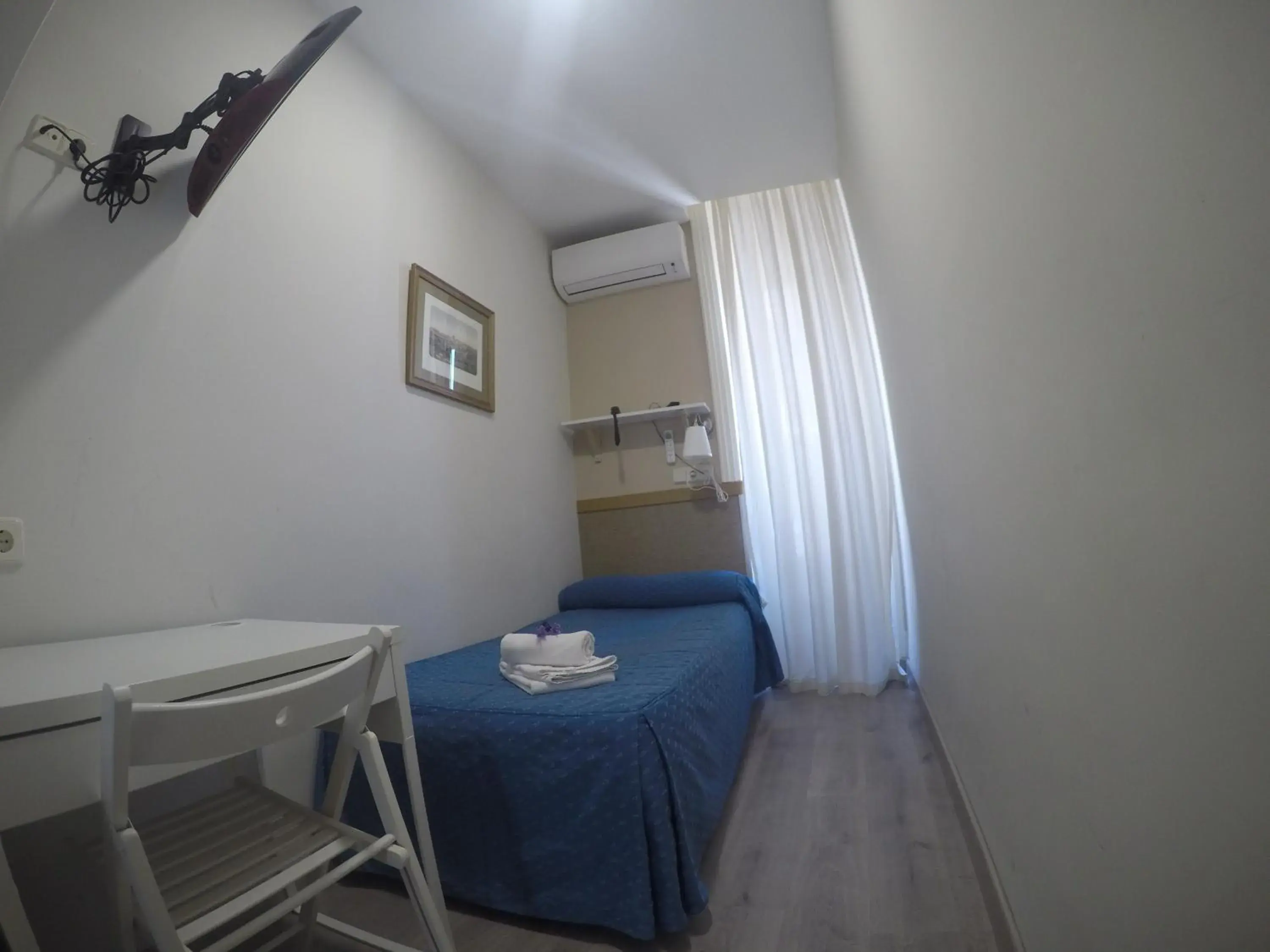 Bedroom in Hostal El Pilar