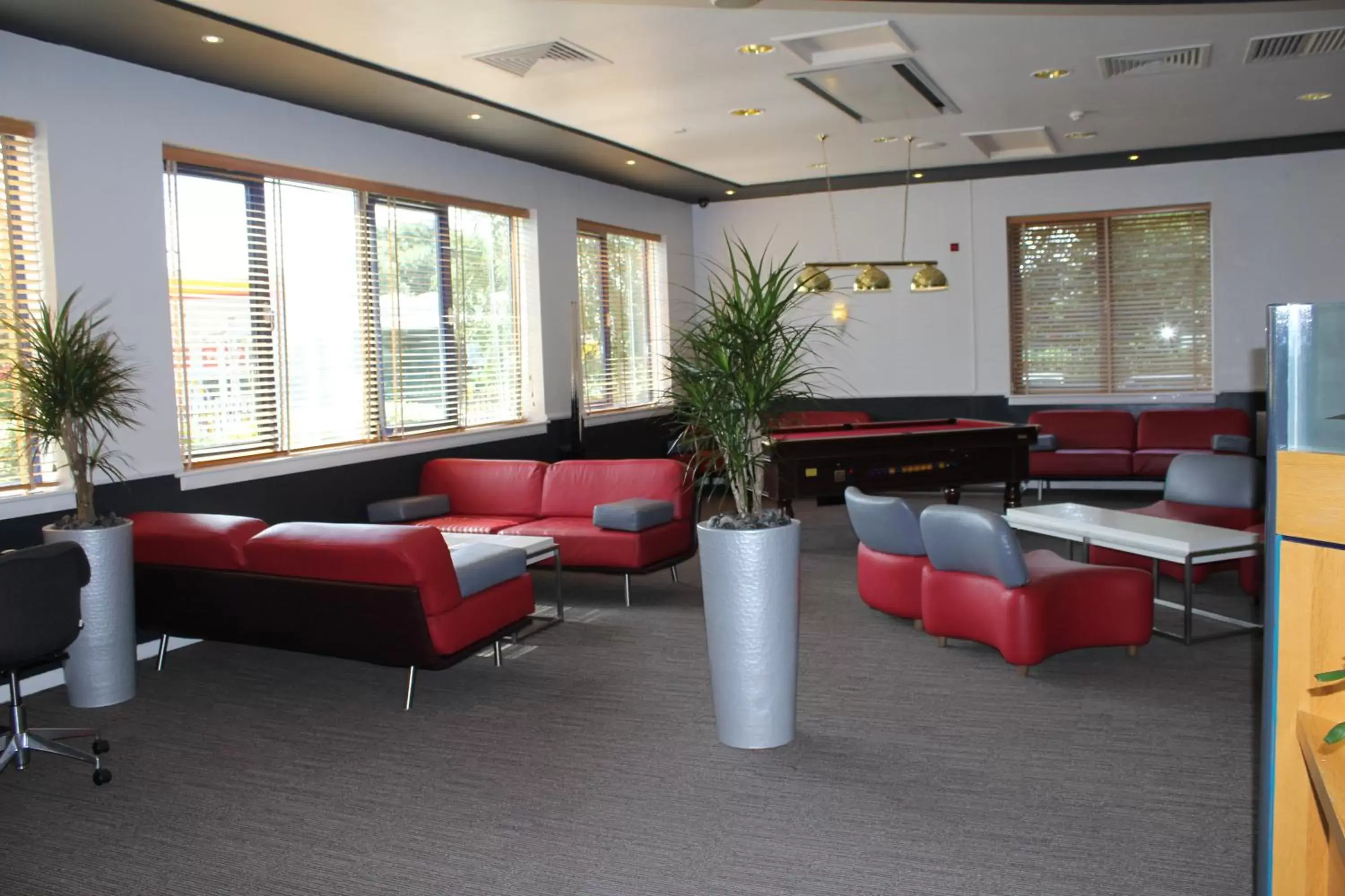 Lounge or bar in ibis Cardiff Gate - International Business Park Lounge or bar in ibis Cardiff Gate - International Business Park