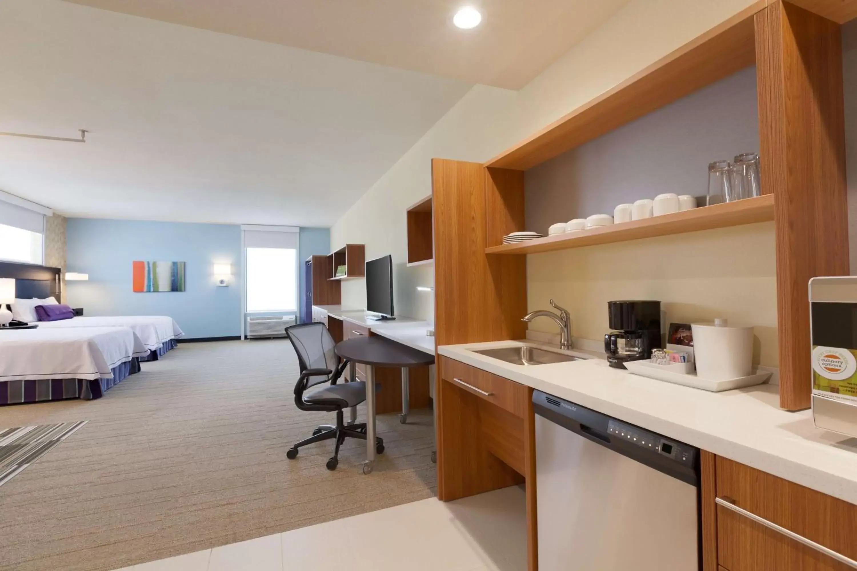 Bedroom, Kitchen/Kitchenette in Home2 Suites By Hilton Oklahoma City Quail Springs