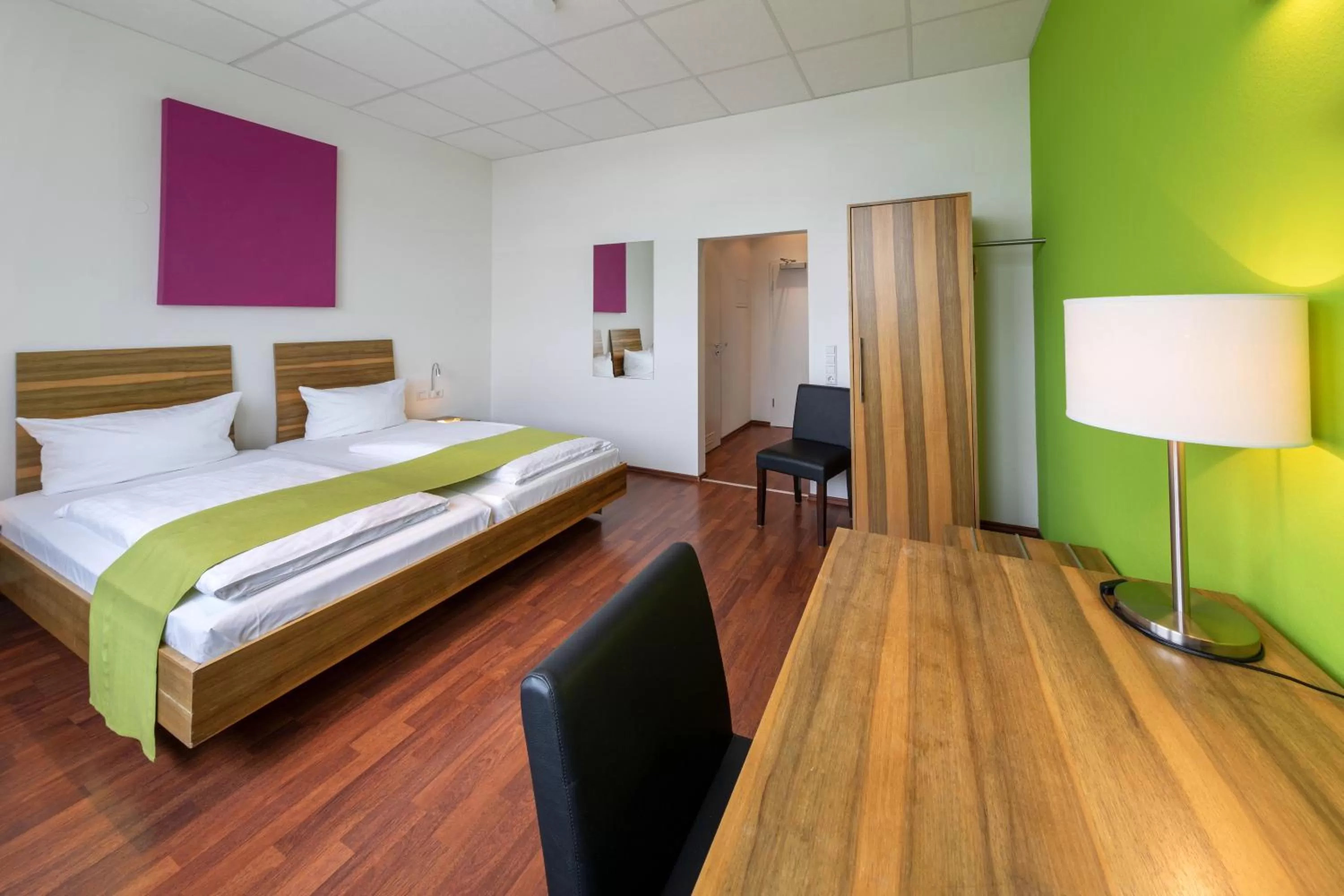 Photo of the whole room, Bed in AMH Airport-Messe-Hotel Stuttgart