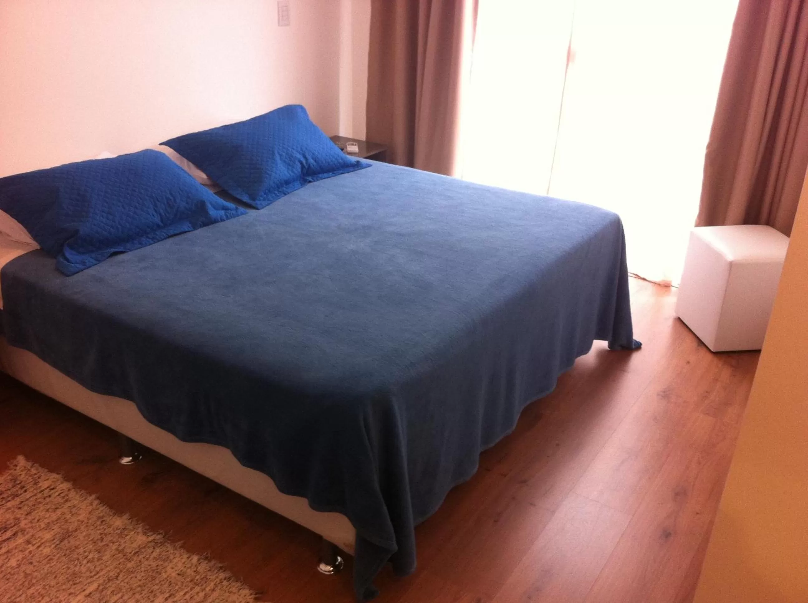 Bed in The Hyperion Boutique Hotel