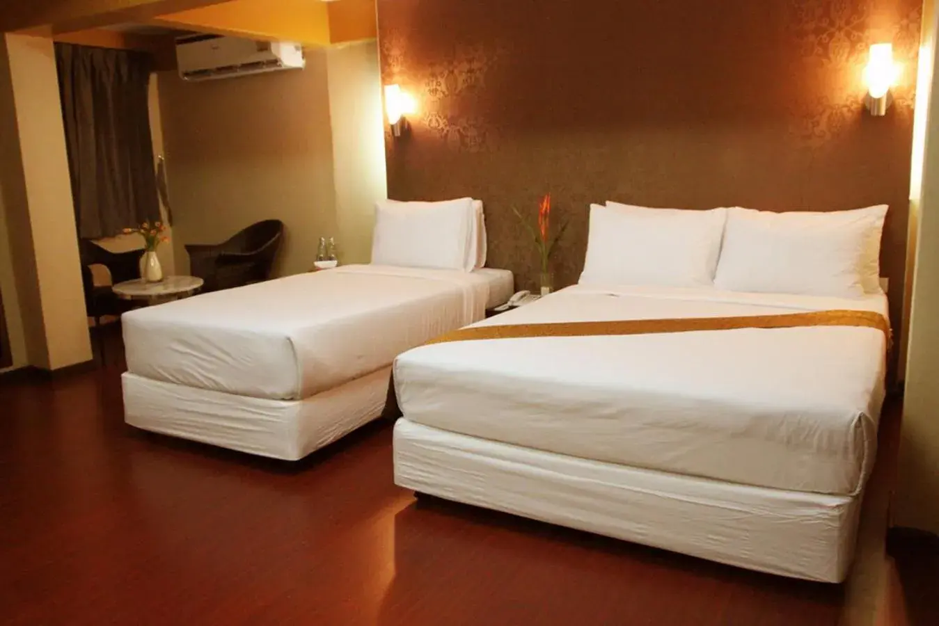 Bed in Visiting Card Hotel & Resort