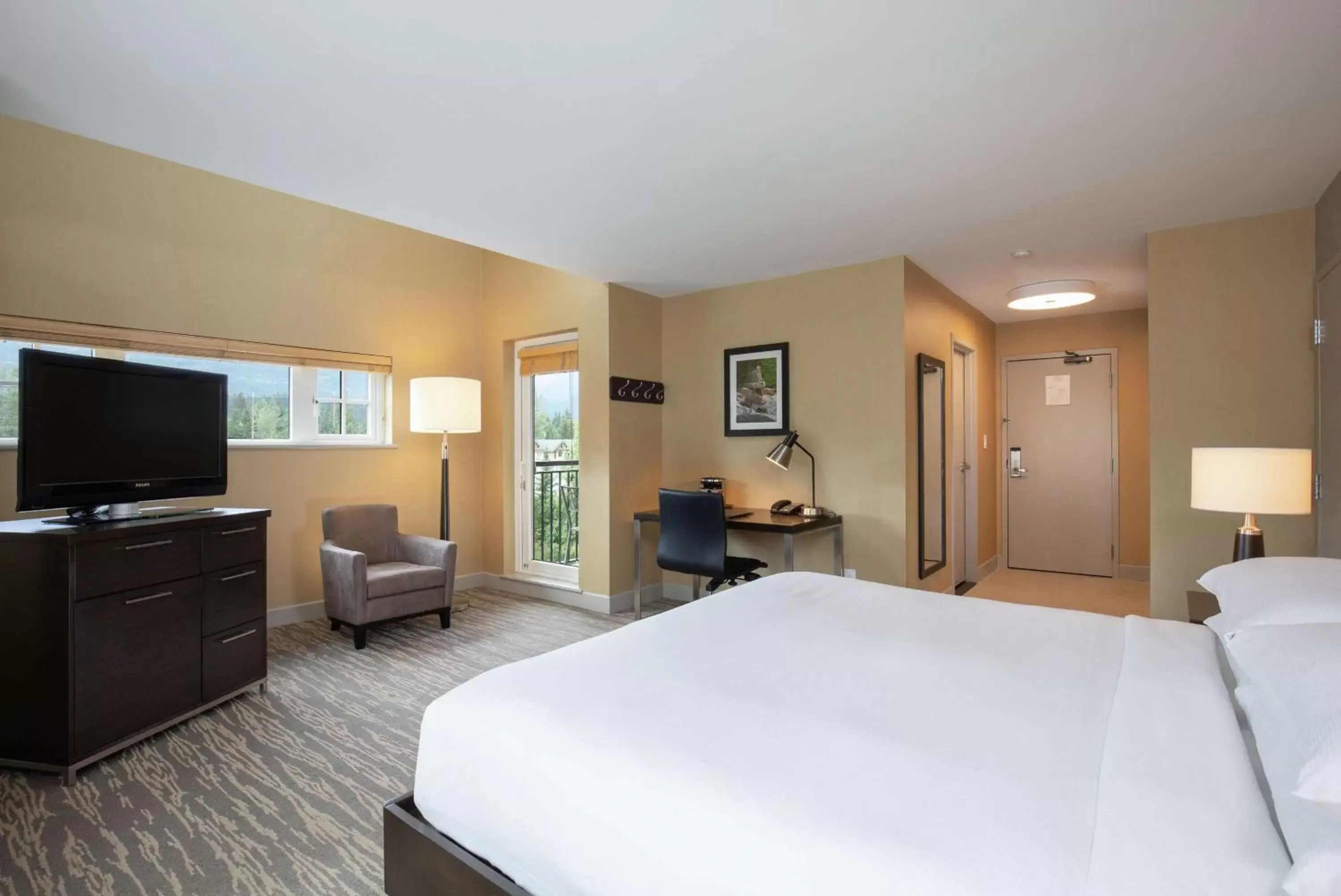 Bedroom, TV/Entertainment Center in Hilton Whistler Resort & Spa