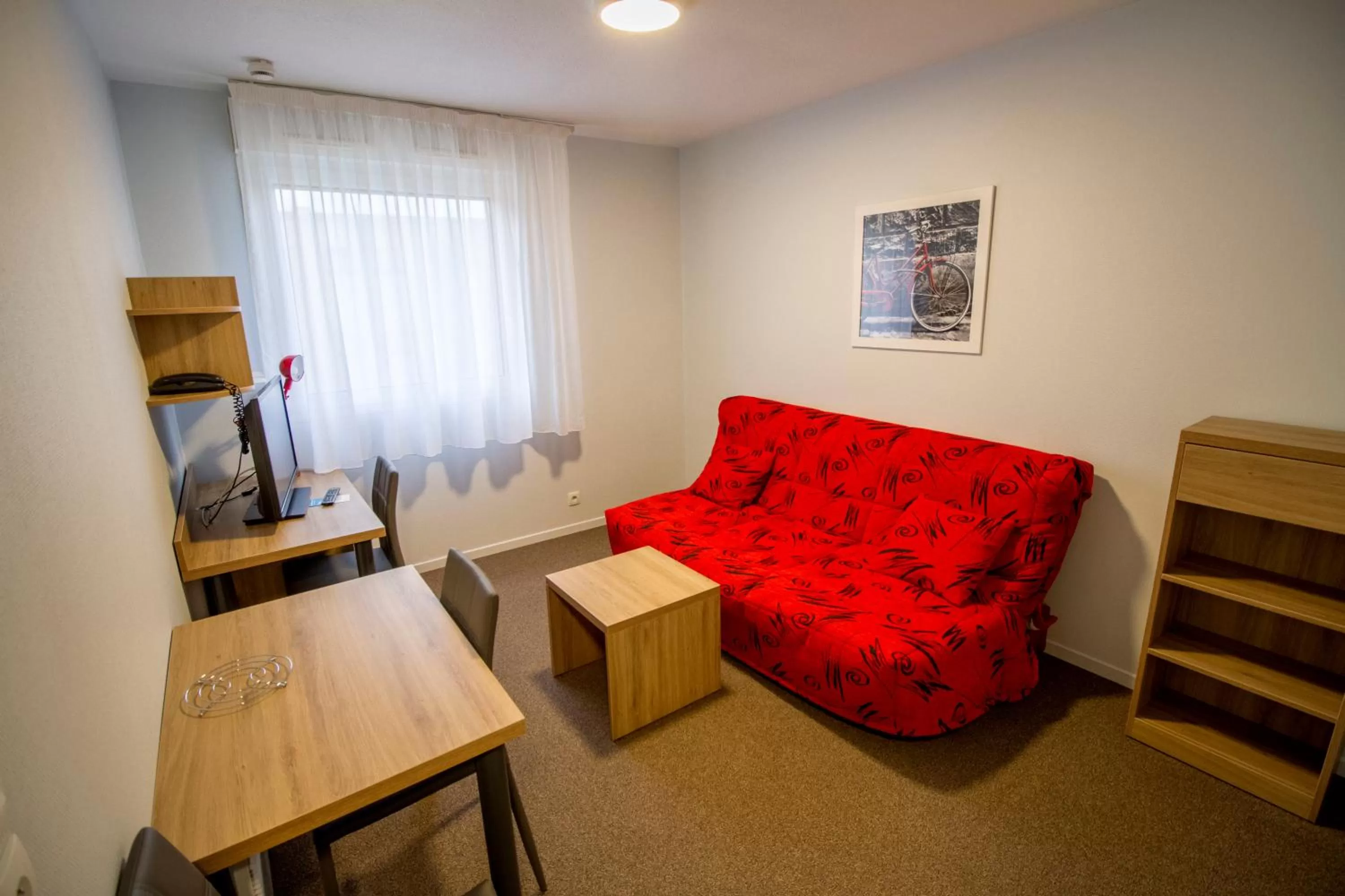 Living room in KOSY Appart'hôtel Le Champ De Mars Reims