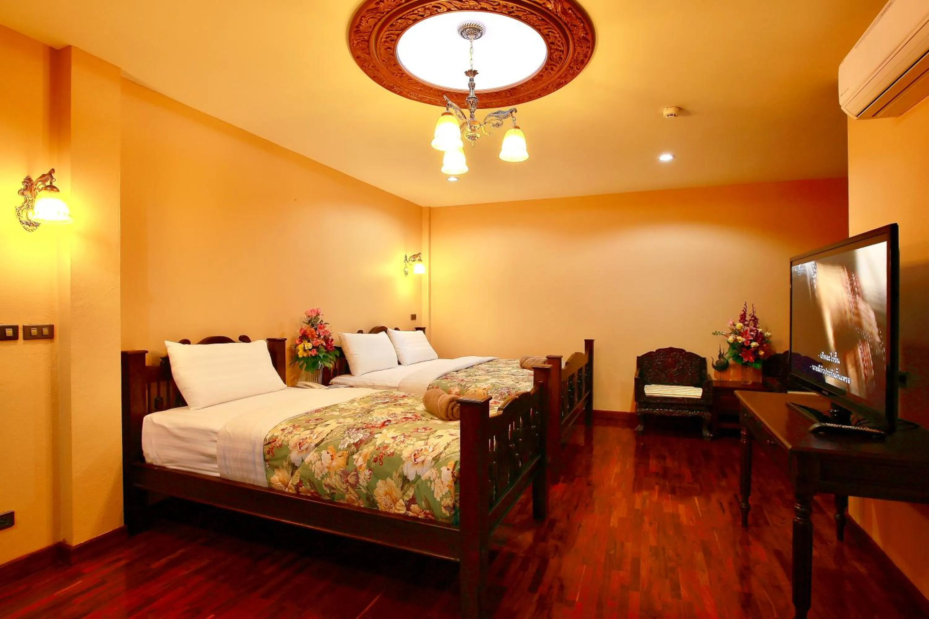 Photo of the whole room, Bed in At Chiang Mai Hotel