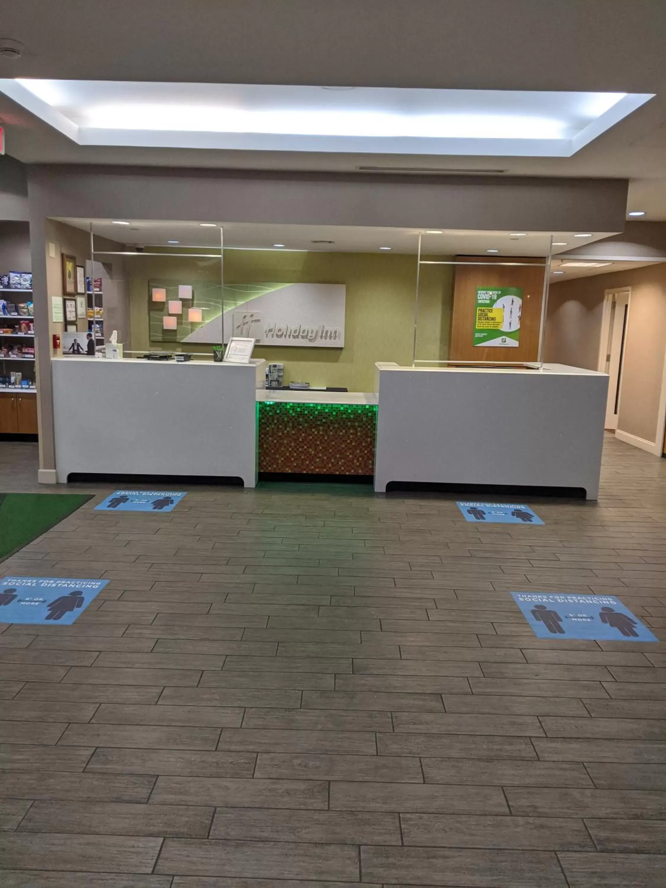 Lobby or reception in Holiday Inn Charlotte University by IHG Lobby or reception in Holiday Inn Charlotte University by IHG