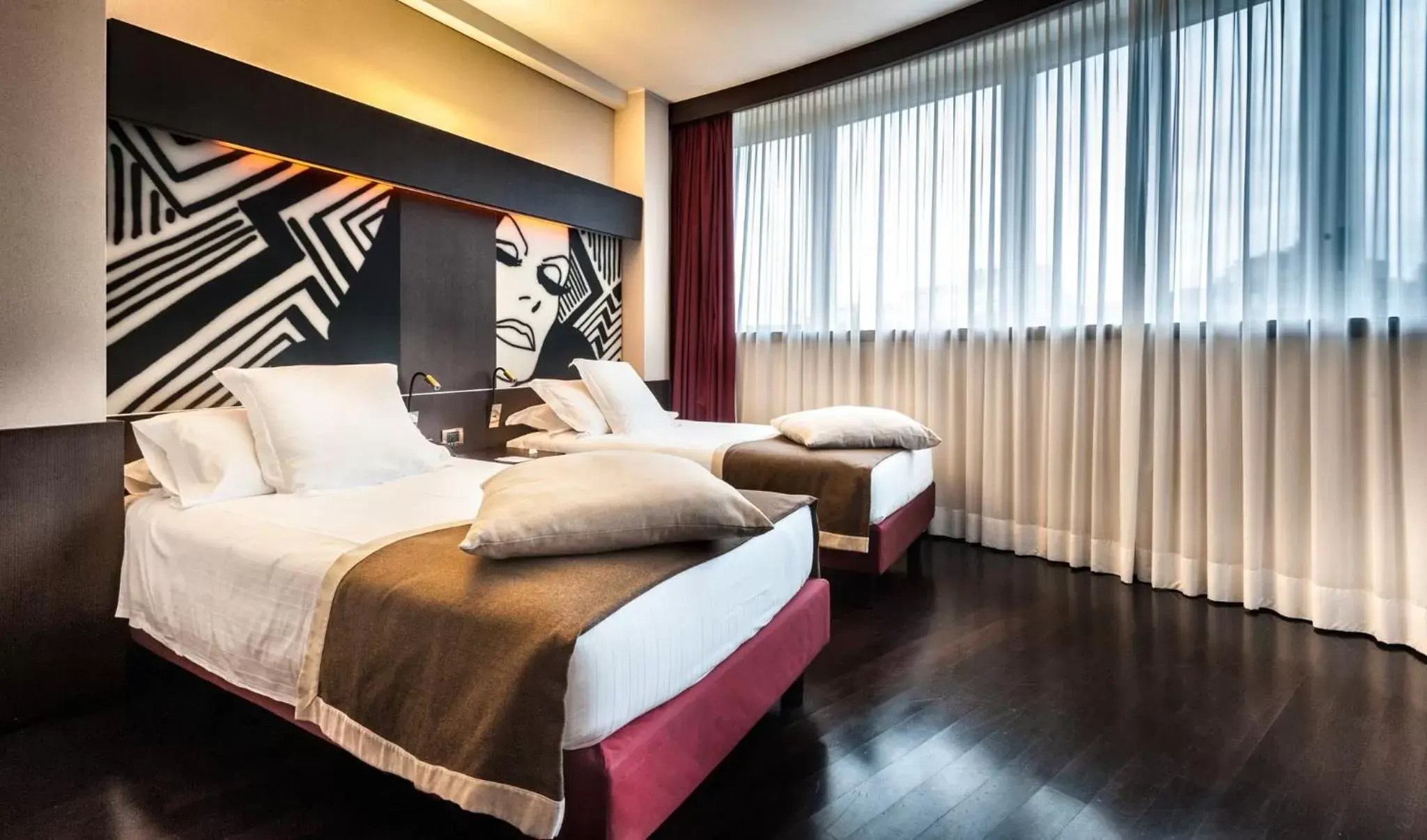 Photo of the whole room, Bed in Crowne Plaza Milan City, an IHG Hotel