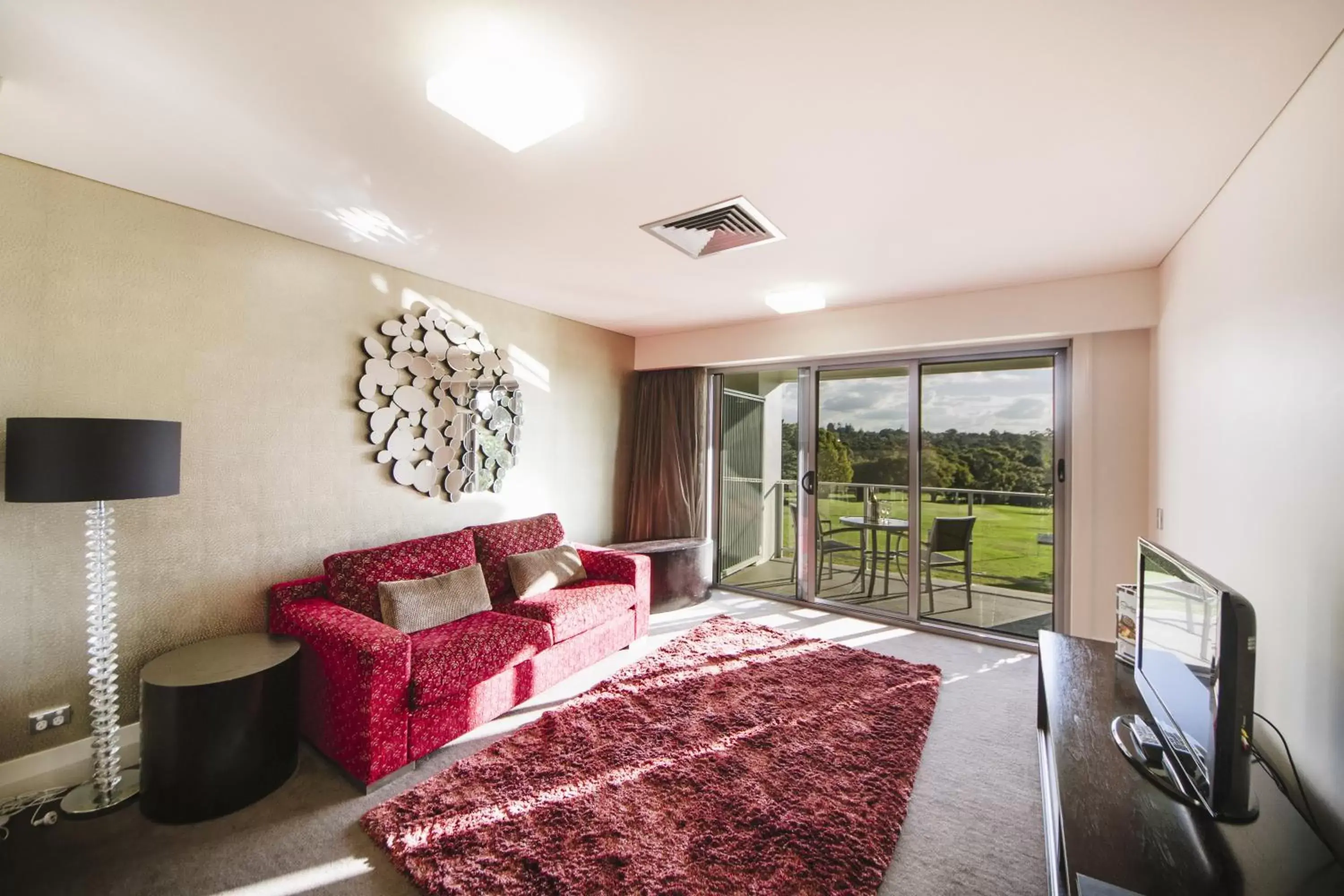 TV and multimedia, Seating Area in City Golf Club Motel