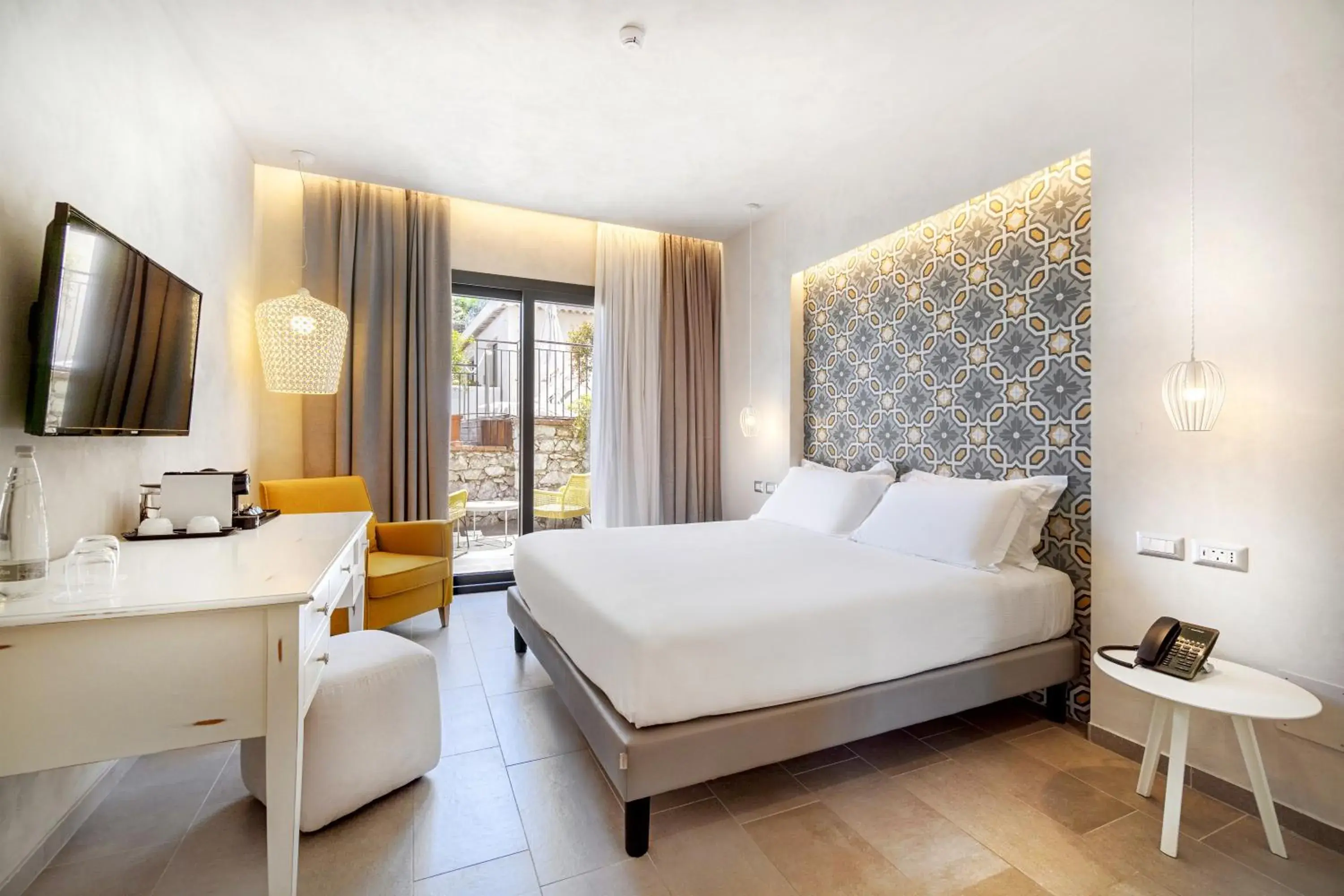 Bed in Villa Fiorita Boutique Hotel