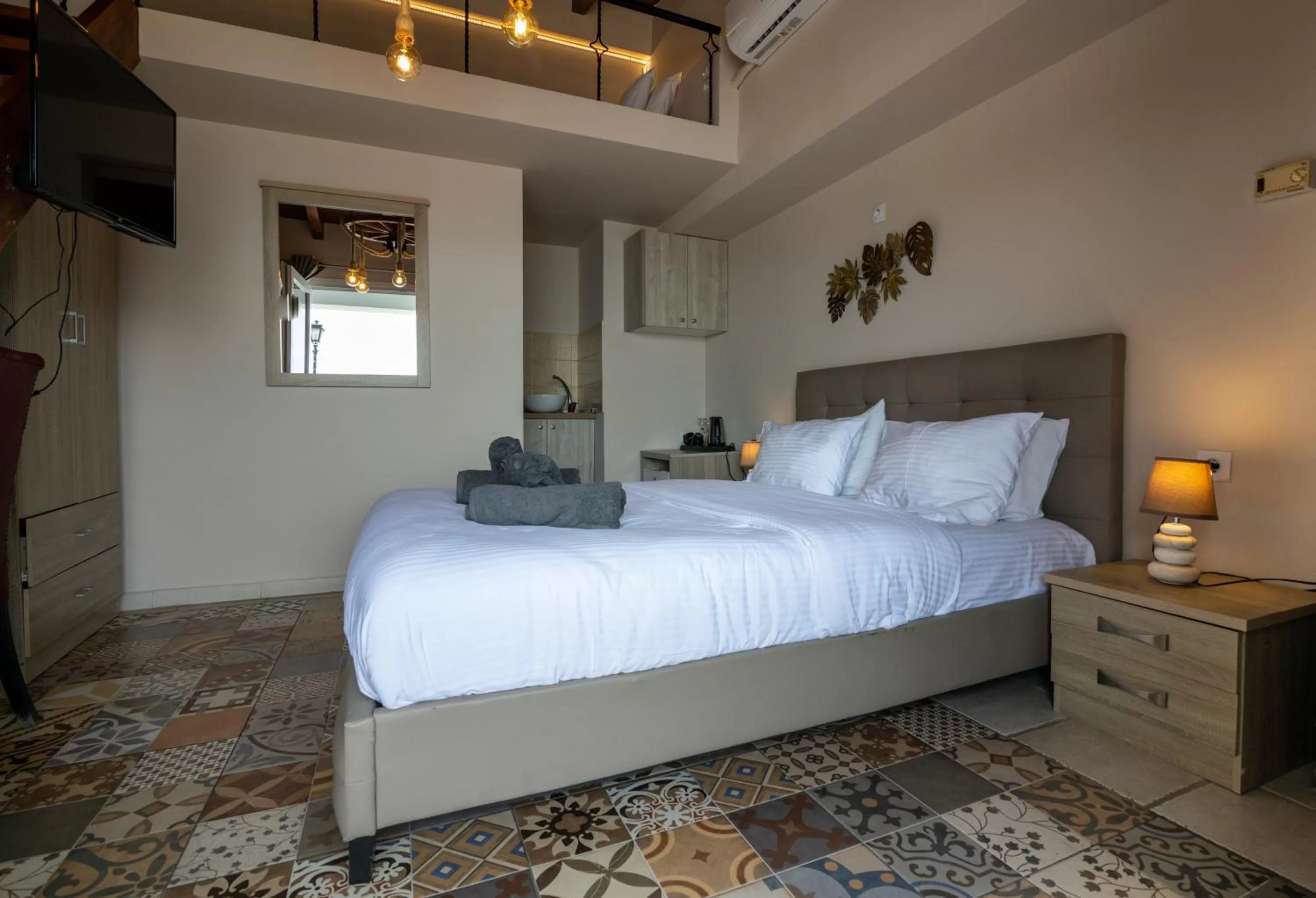 Bed in Votsalakia Hotel & Luxury Apartments