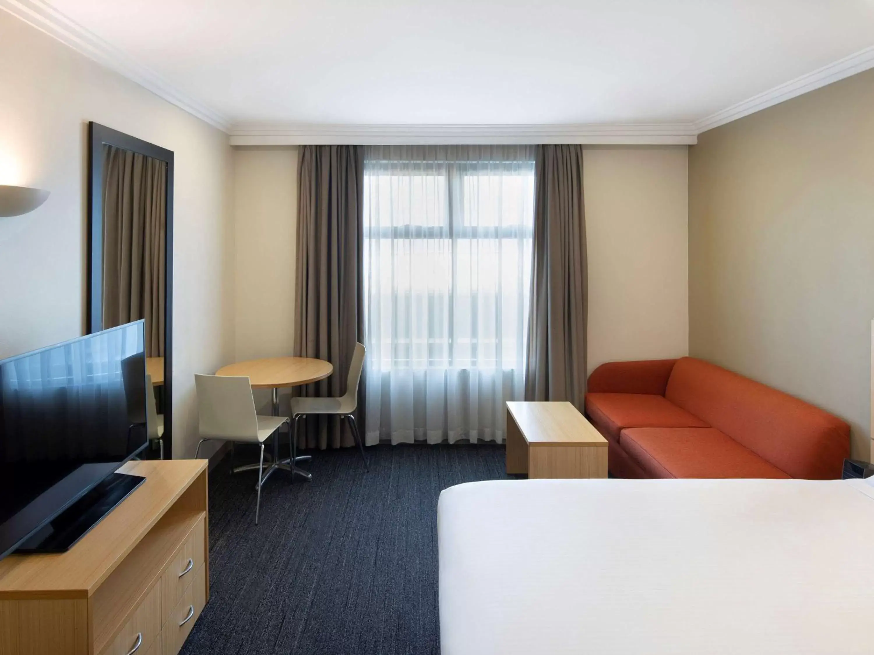 Bedroom, Seating Area in Mercure Sydney Blacktown