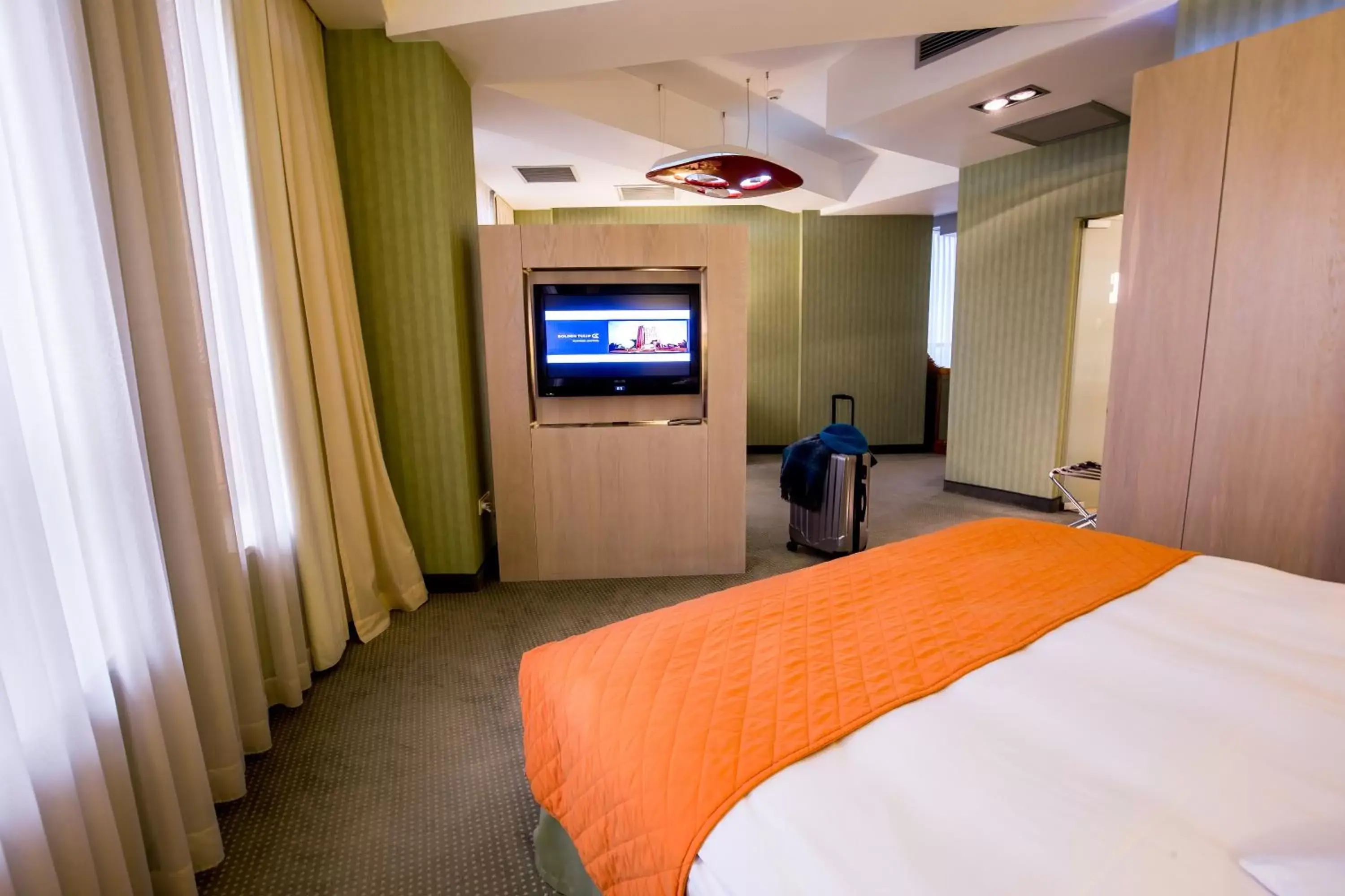 TV and multimedia, TV/Entertainment Center in Hotel Golden Tulip Ana Tower Sibiu