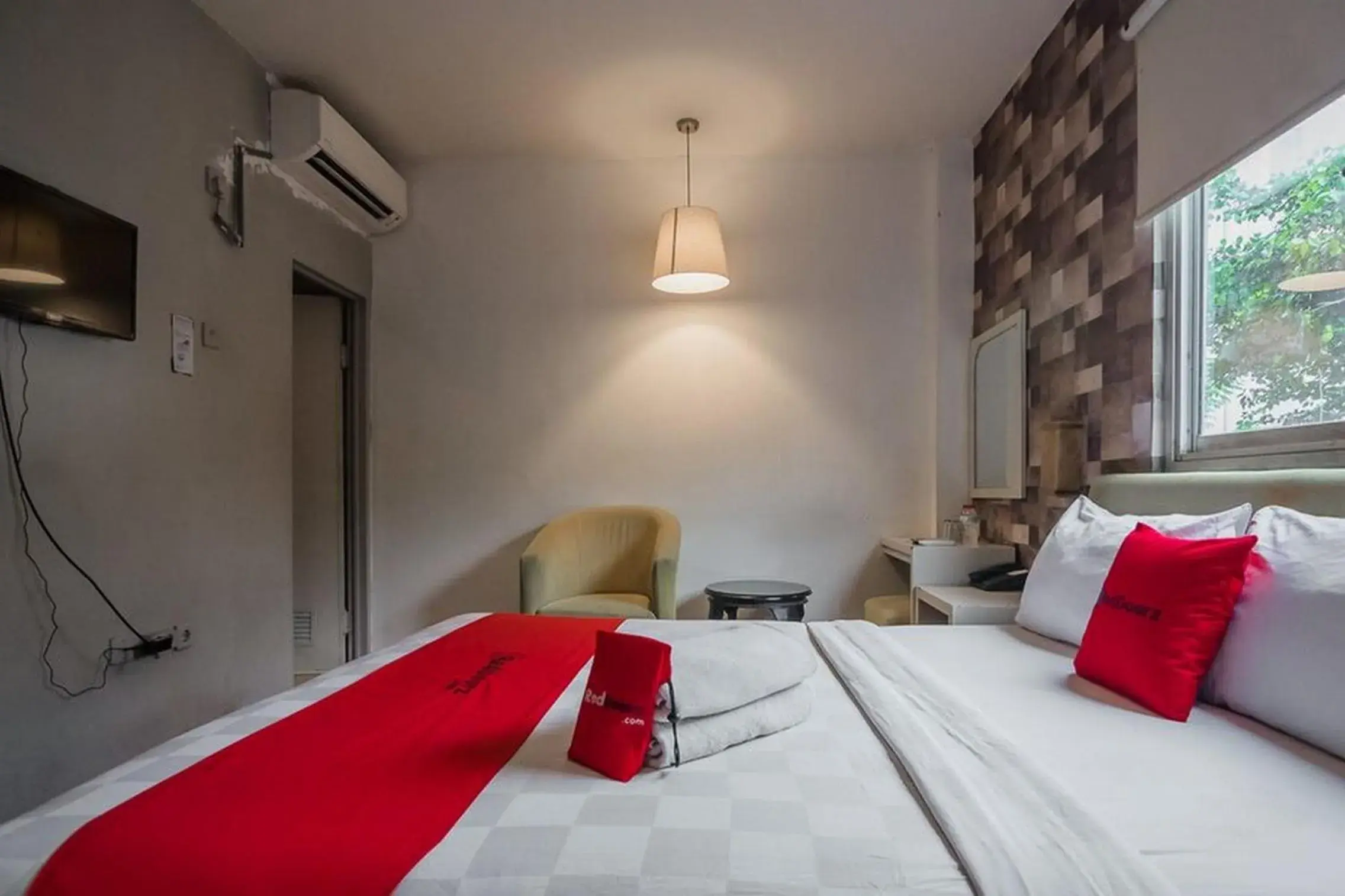 Bedroom in RedDoorz Plus near Mangga Besar Station 2