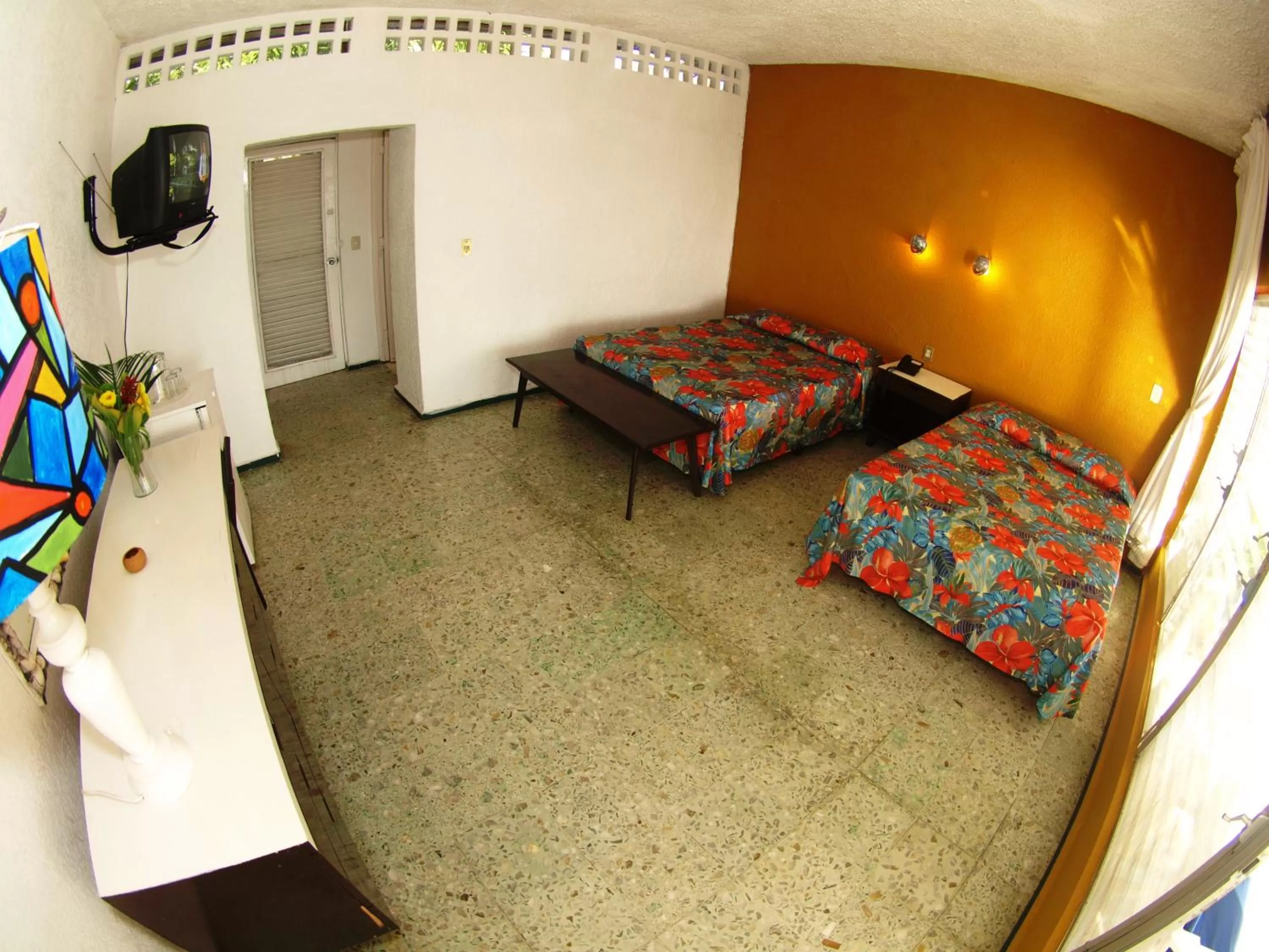 Bed in Hotel Flamingos