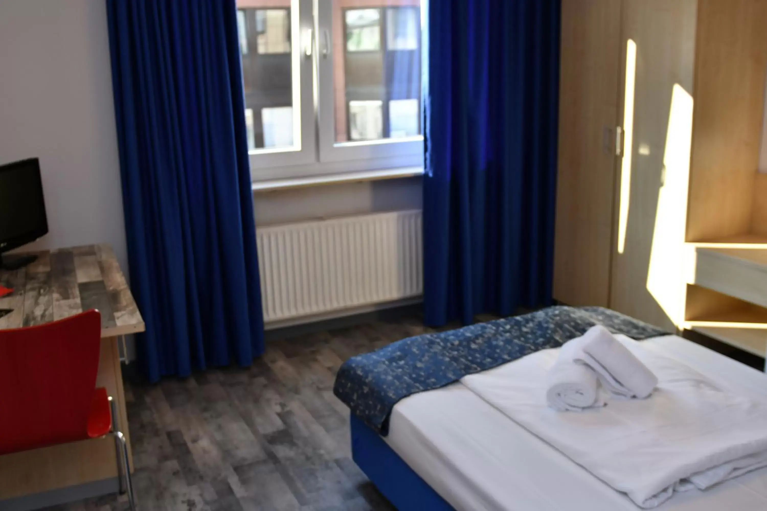 Bed in Hotel Muenchner Hof