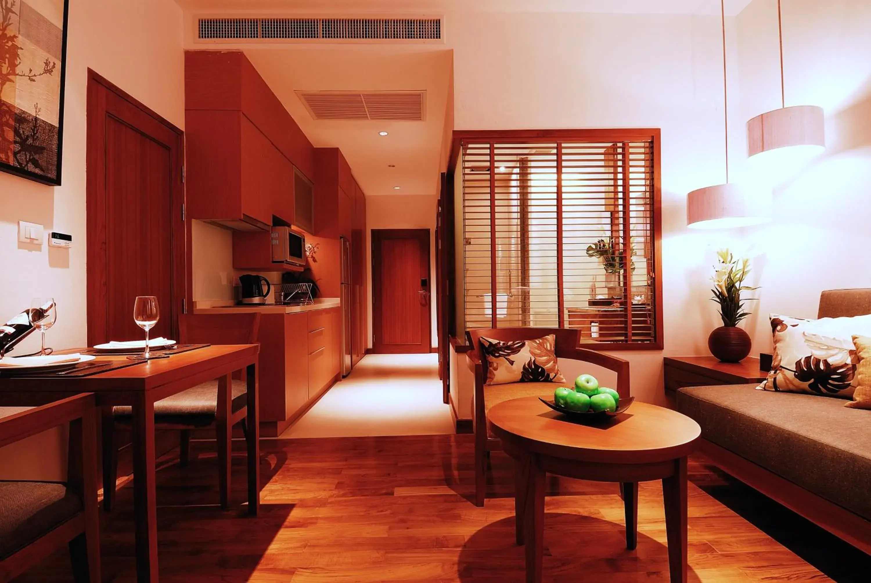 Seating area, Kitchen/Kitchenette in Woodlands Suites Serviced Residences - SHA Extra Plus