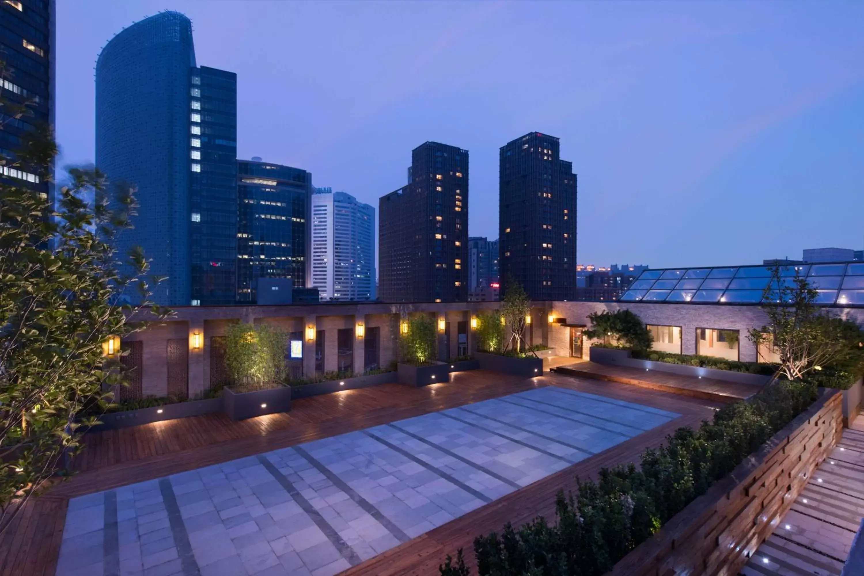 Property building, Swimming Pool in Hilton Beijing Hotel