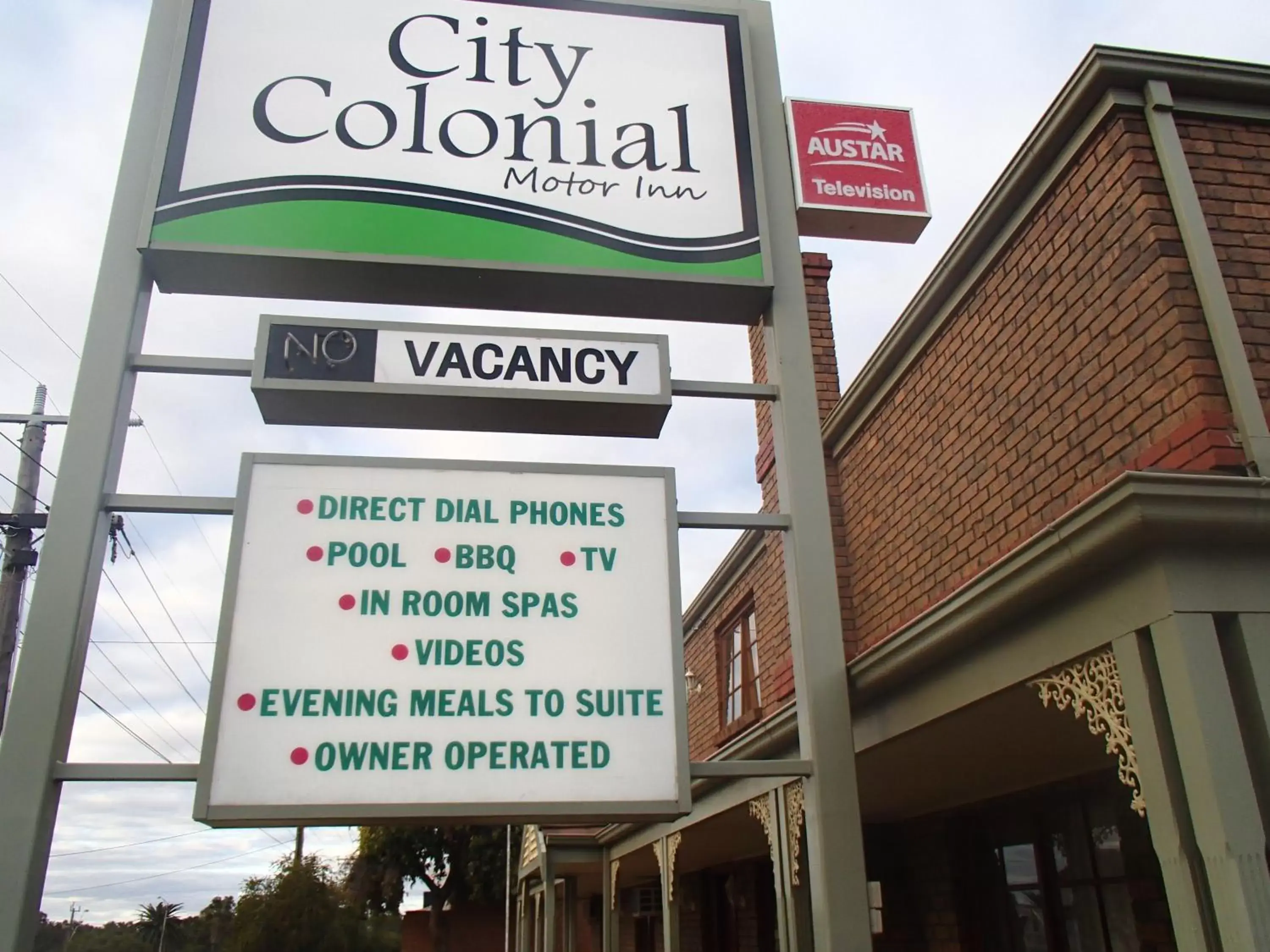 Property logo or sign in City Colonial Motor Inn