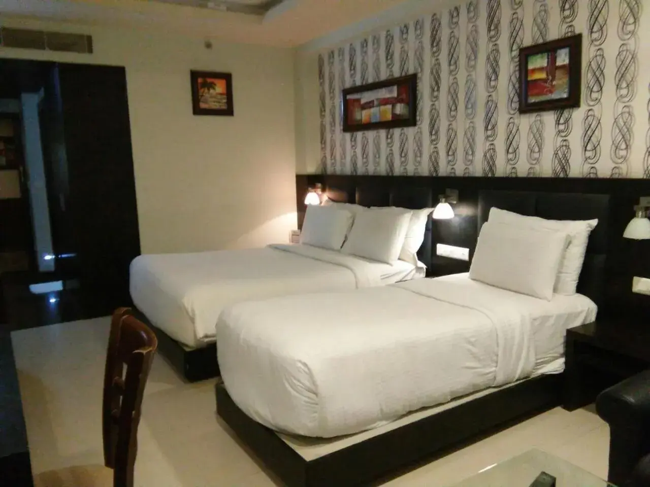 Bed in Pride Ananya Resort Puri