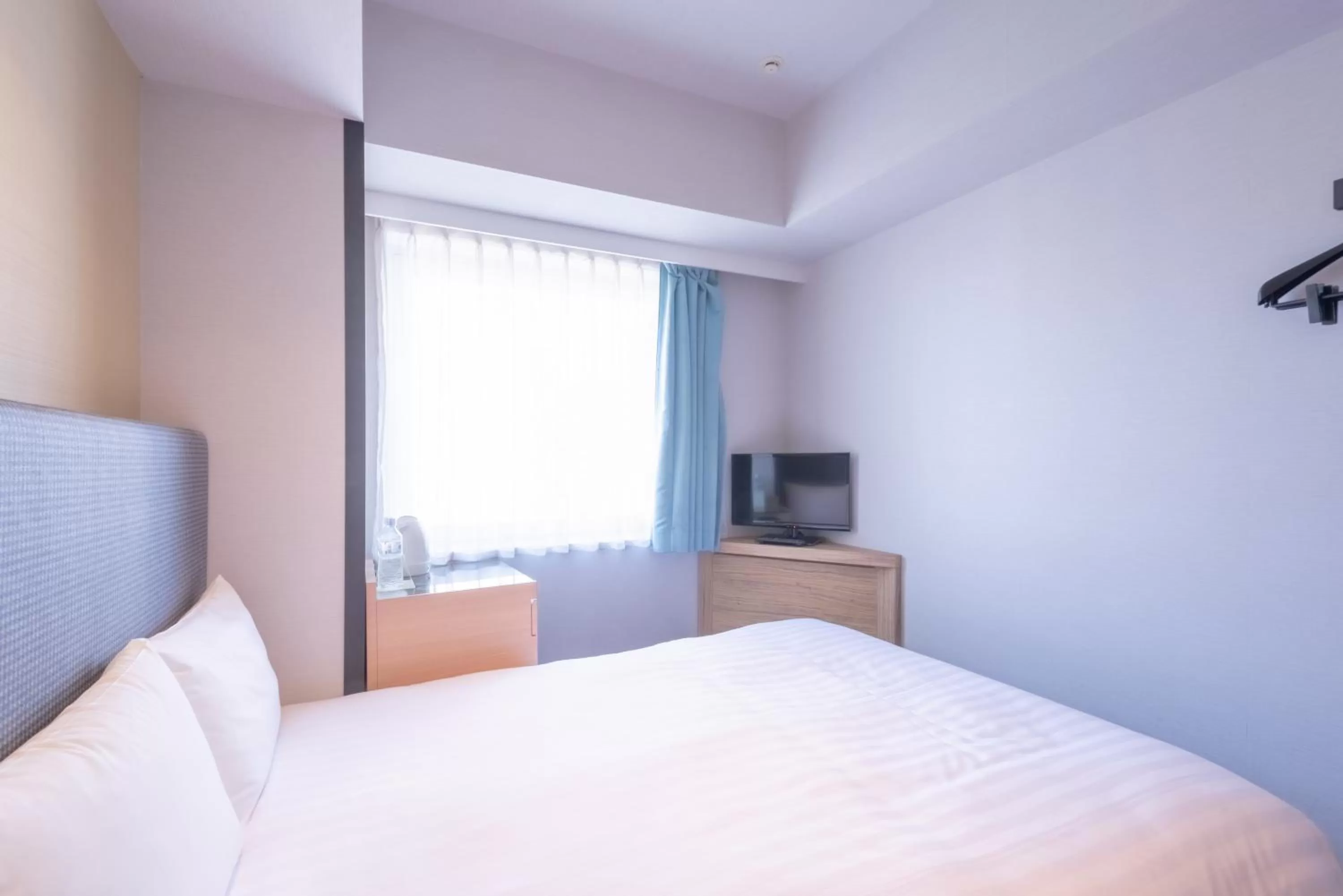 Bed in E Hotel Higashi Shinjuku